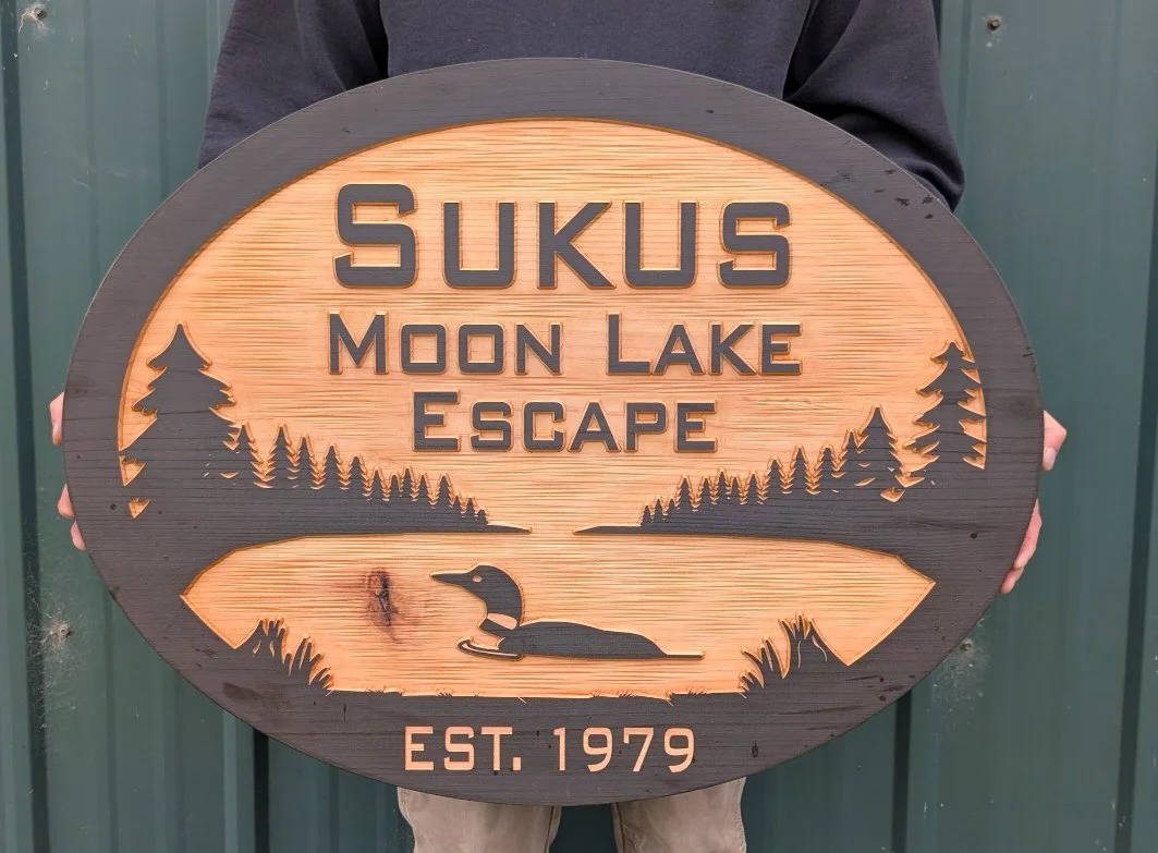 Personalized carved cedar sign with loon on a lake design, custom lake house name sign with established year