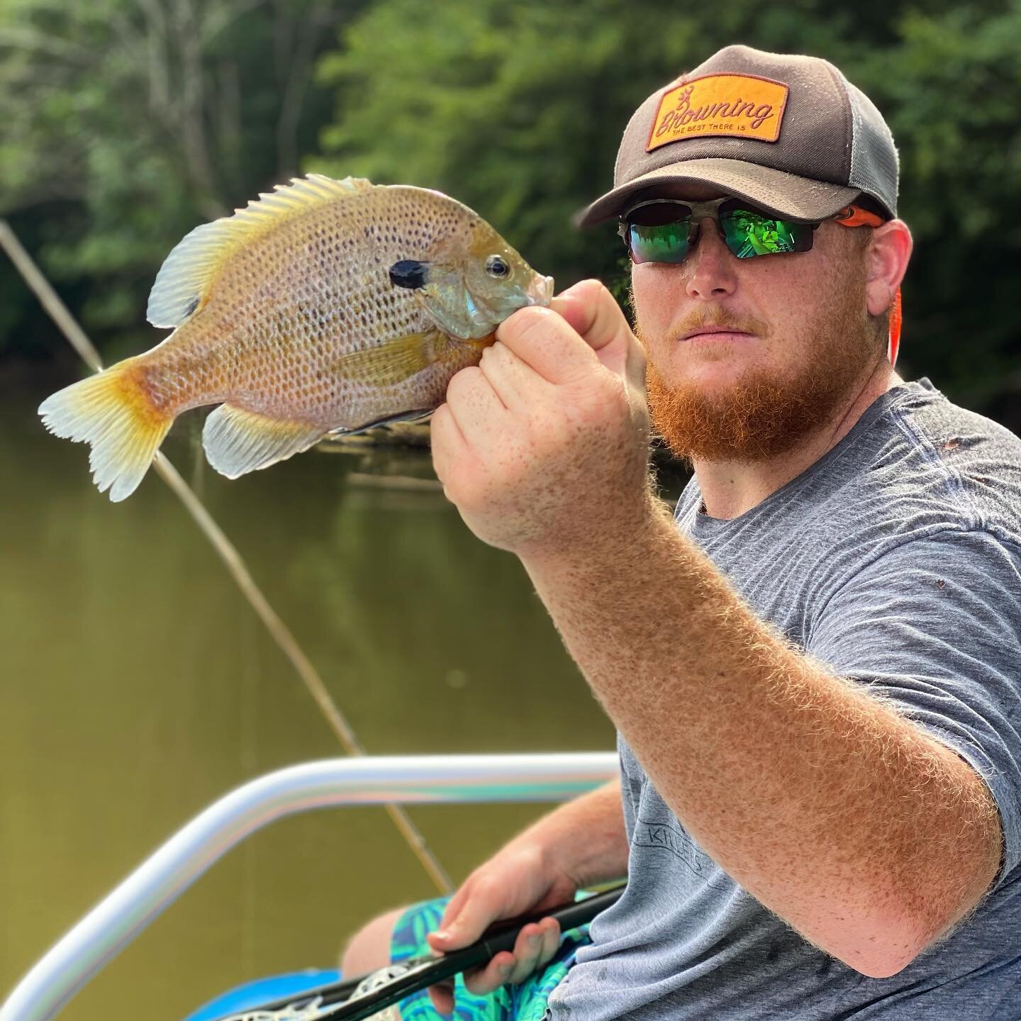 Worlds largest popper-eating sunfish. It&rsquo;s hard to appreciate the size of this beast next to @creek_guru s bear mitts #flyfishing #sunfish #bream #popper #topwater #float #river #driftboat #catchoftheday