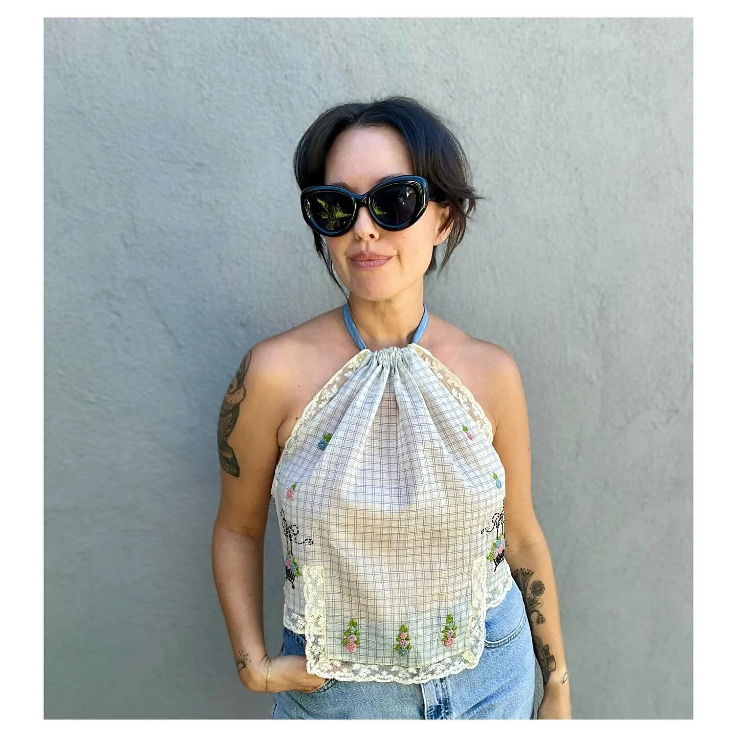 DLG Vintage Apron Halter Top

Features Hand Embroidery

Sheer Cotton Fabrication and Delicate Lace trim

One of a Kind.

Fits XS/S-M

$40