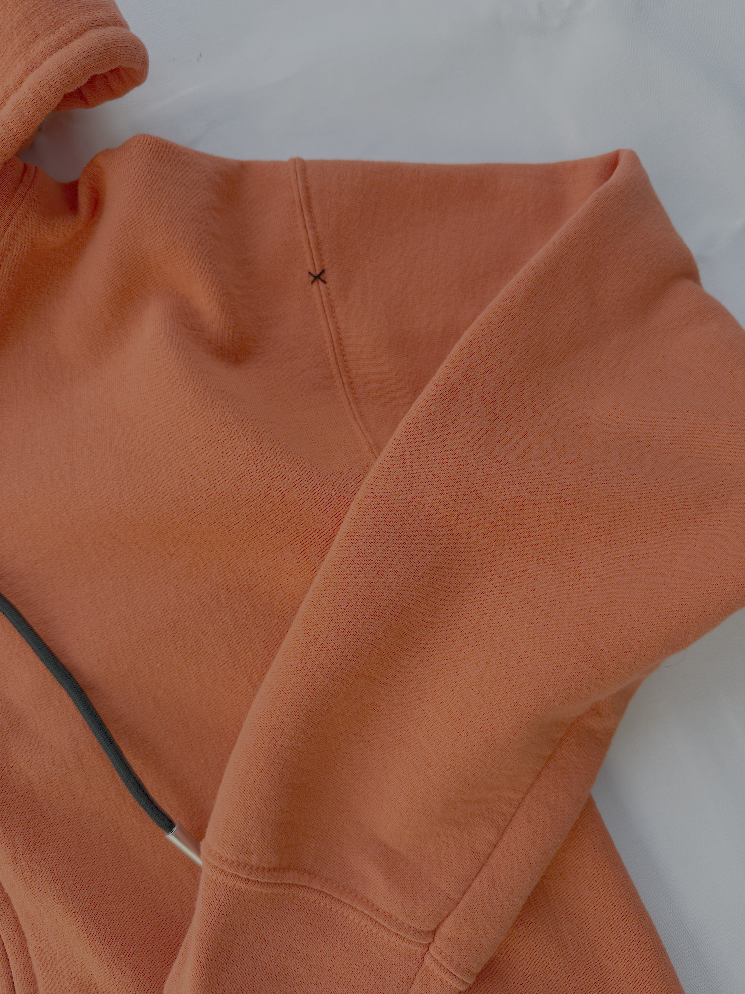 LOS ILLEGALS ORANGE HOODIE GRAPHIC X STITCH.png