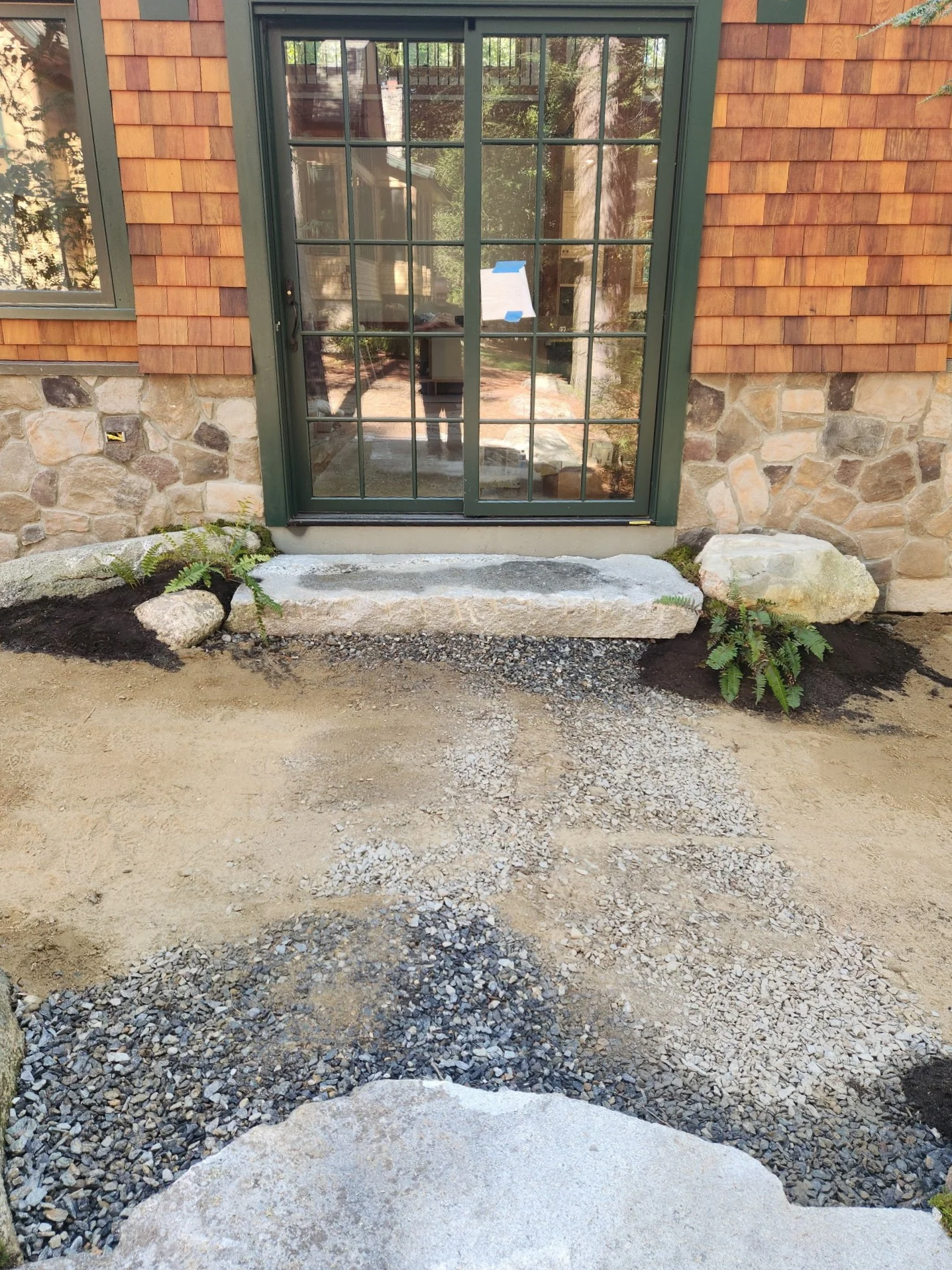 Granite foundation wall and entrance step.png