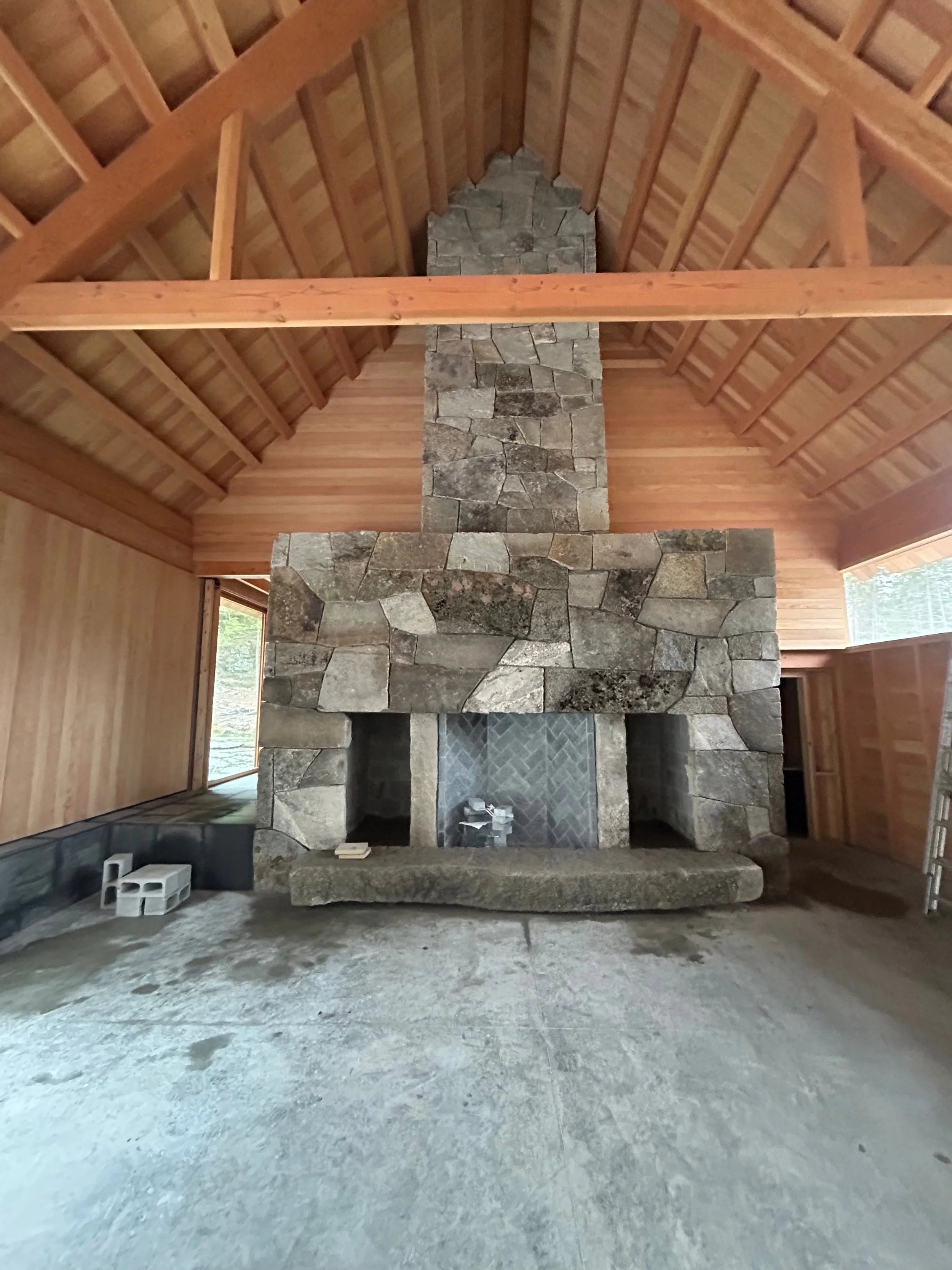 Granite hearth and veneered chimney.jpeg
