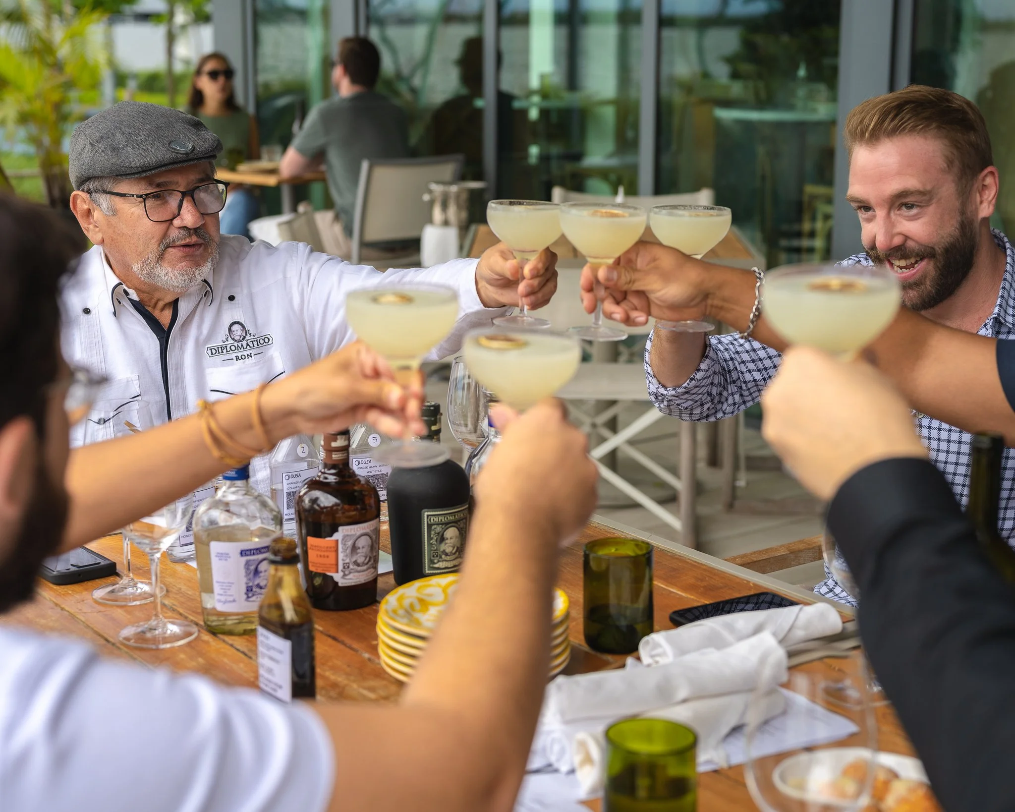 Diplomático Rum event at Amara at Paraiso in Edgewater, featuring master rum distiller Nelson Hernandez sharing cocktails with hospitality industry professionals.