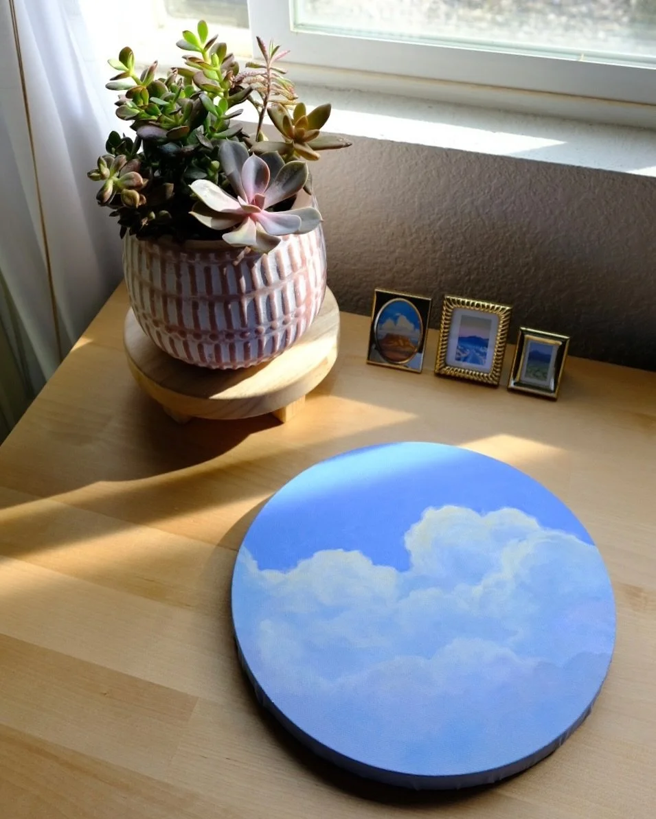 A round canvas I finished recently, like a little porthole into another place ☁️☁️☁️ #oilpainting #cloudappreciation