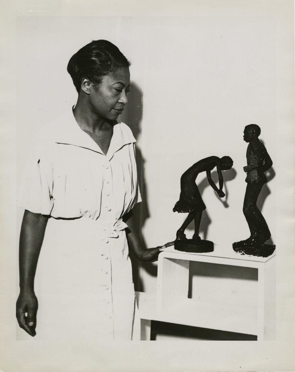 Unidentified photographer. Augusta Savage viewing two of her sculptures, “Susie Q” and “Truckin,” c.&nbsp;1939. 