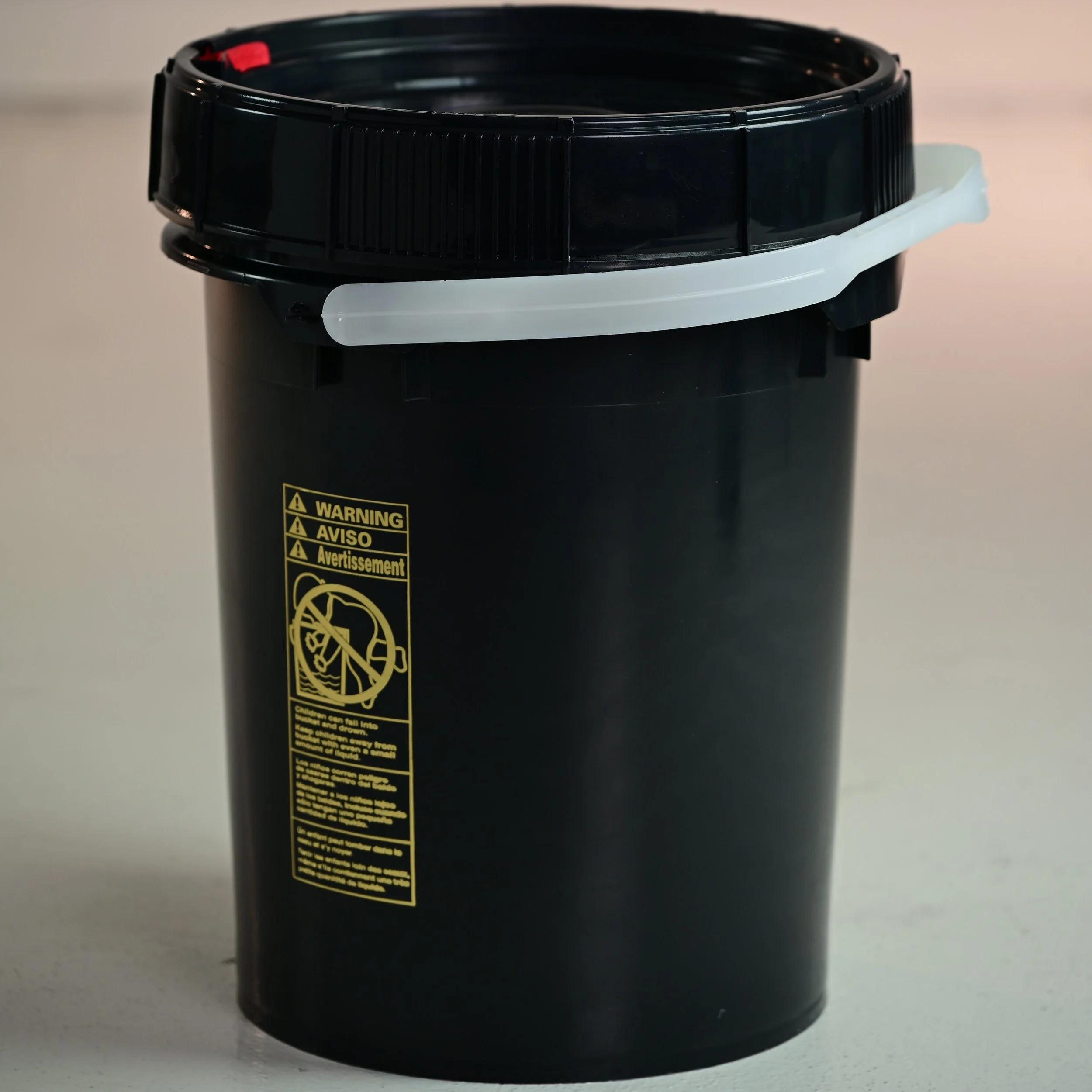 5 gallon poly pail Life Latch lid close up — UN certified packing groups I II III Southern California