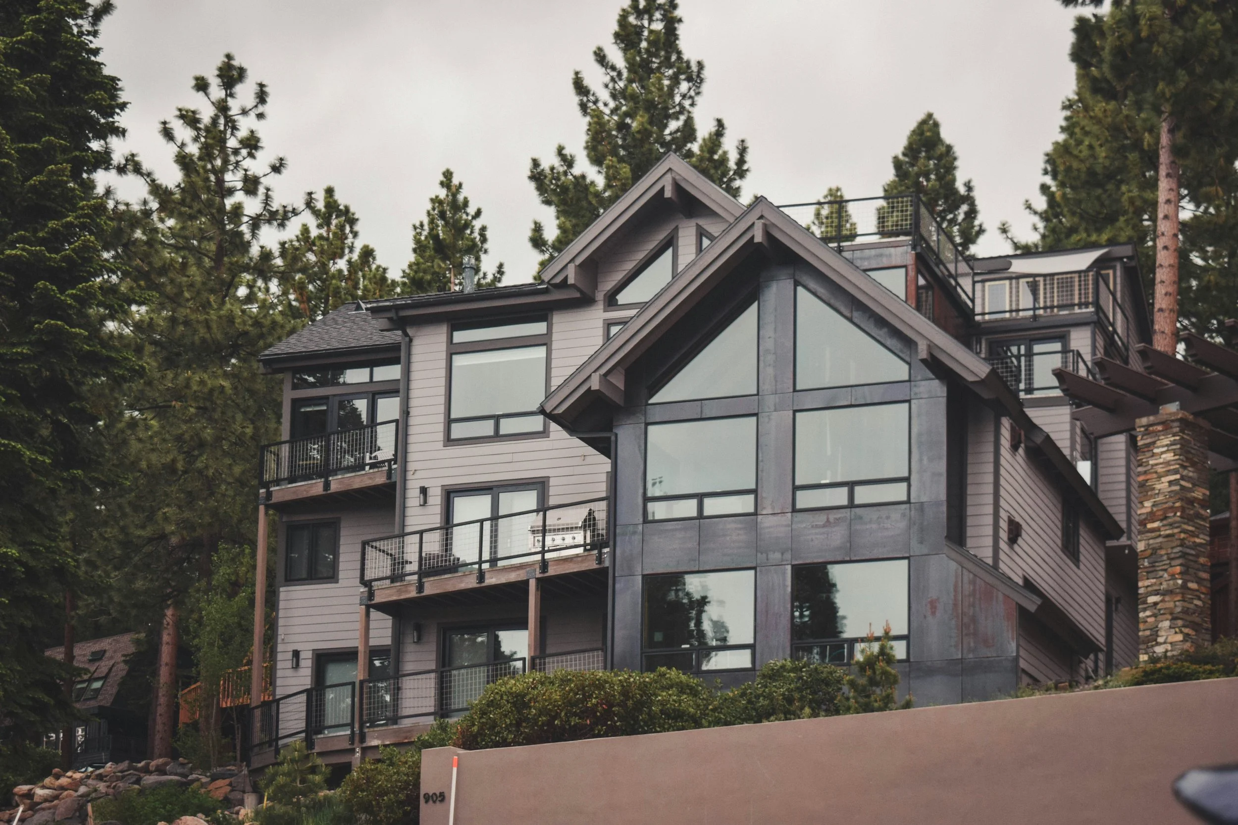 Home in neighborhood surroounded by trees