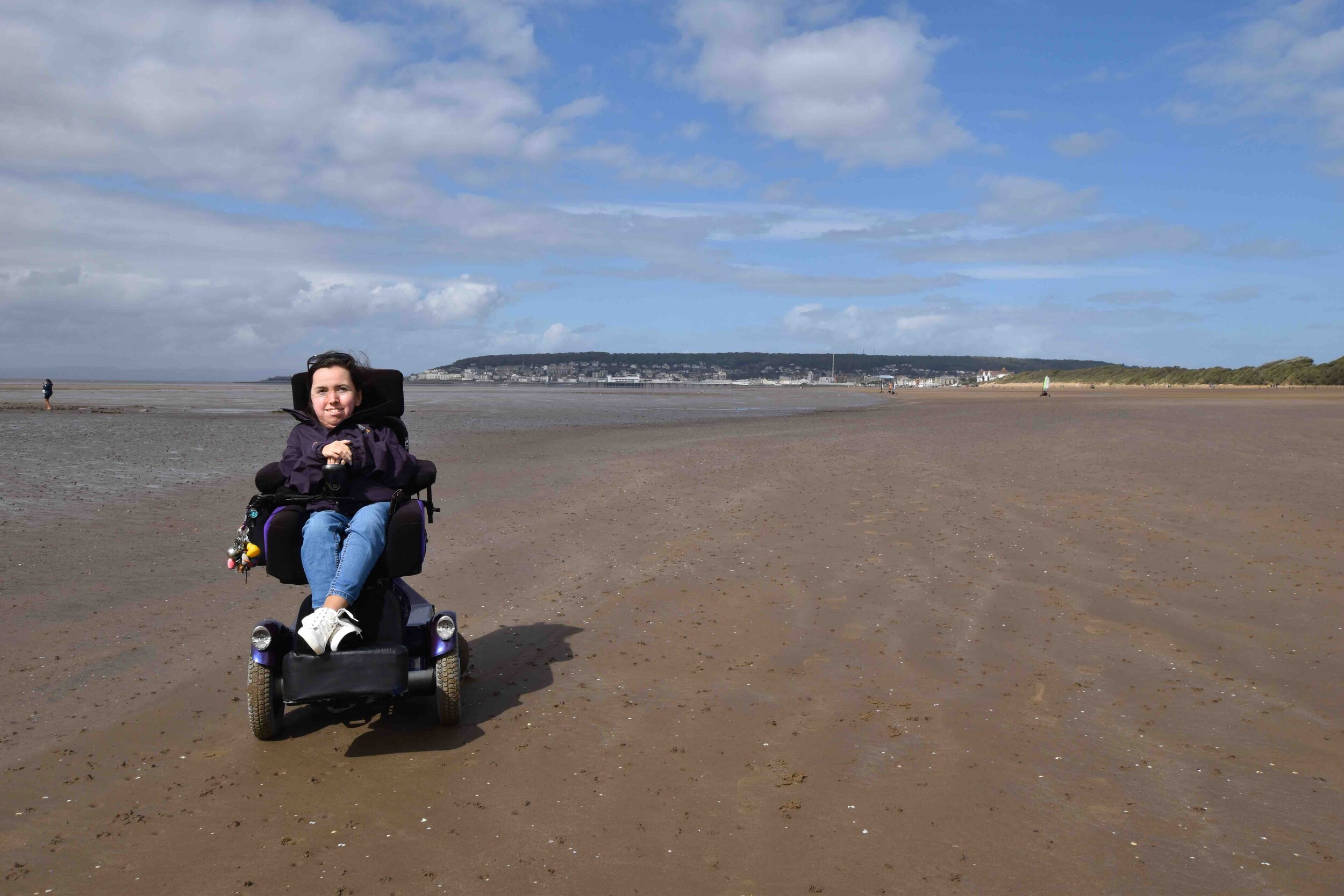 Wheelchair user on Uphill beach