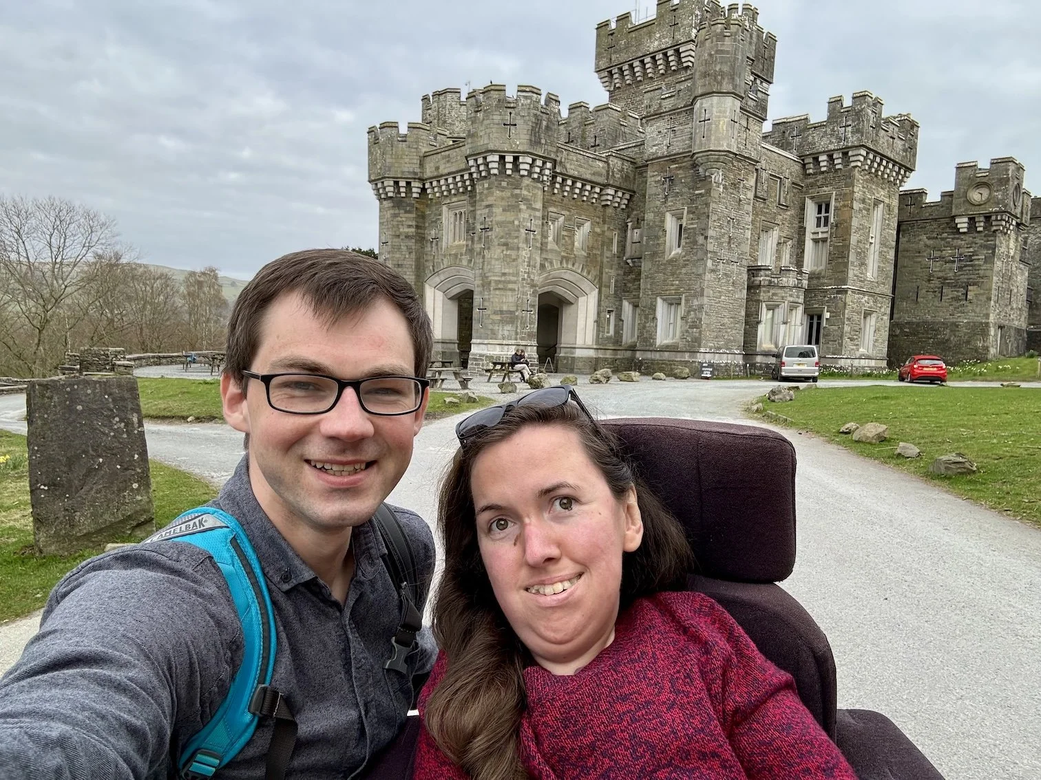 A wheelchair user and her partner at National Trust Wray Castle 