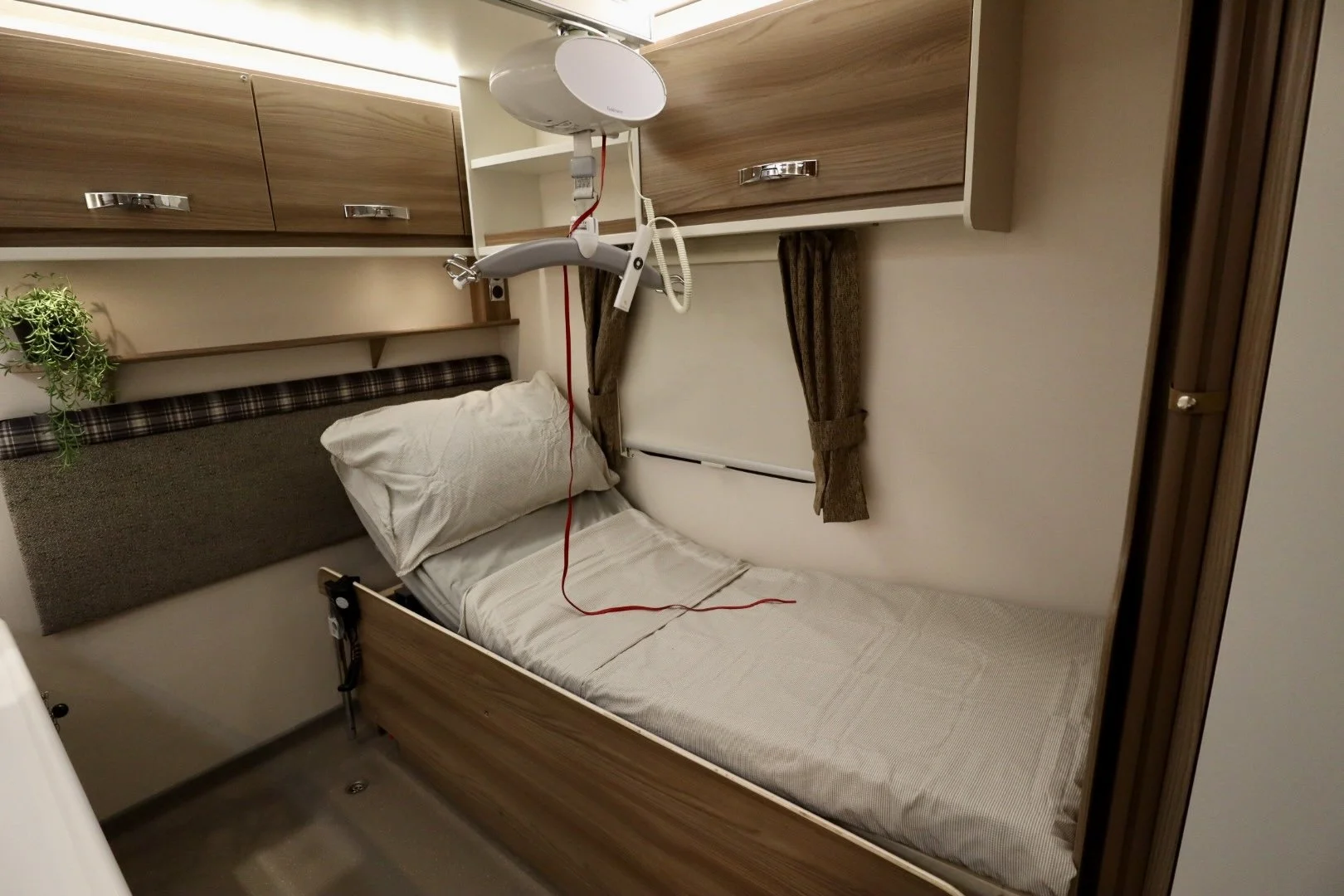 Profiling bed - LIV Swift Sprite Super Quattro FB - Coachbuilt wheelchair accessible caravan