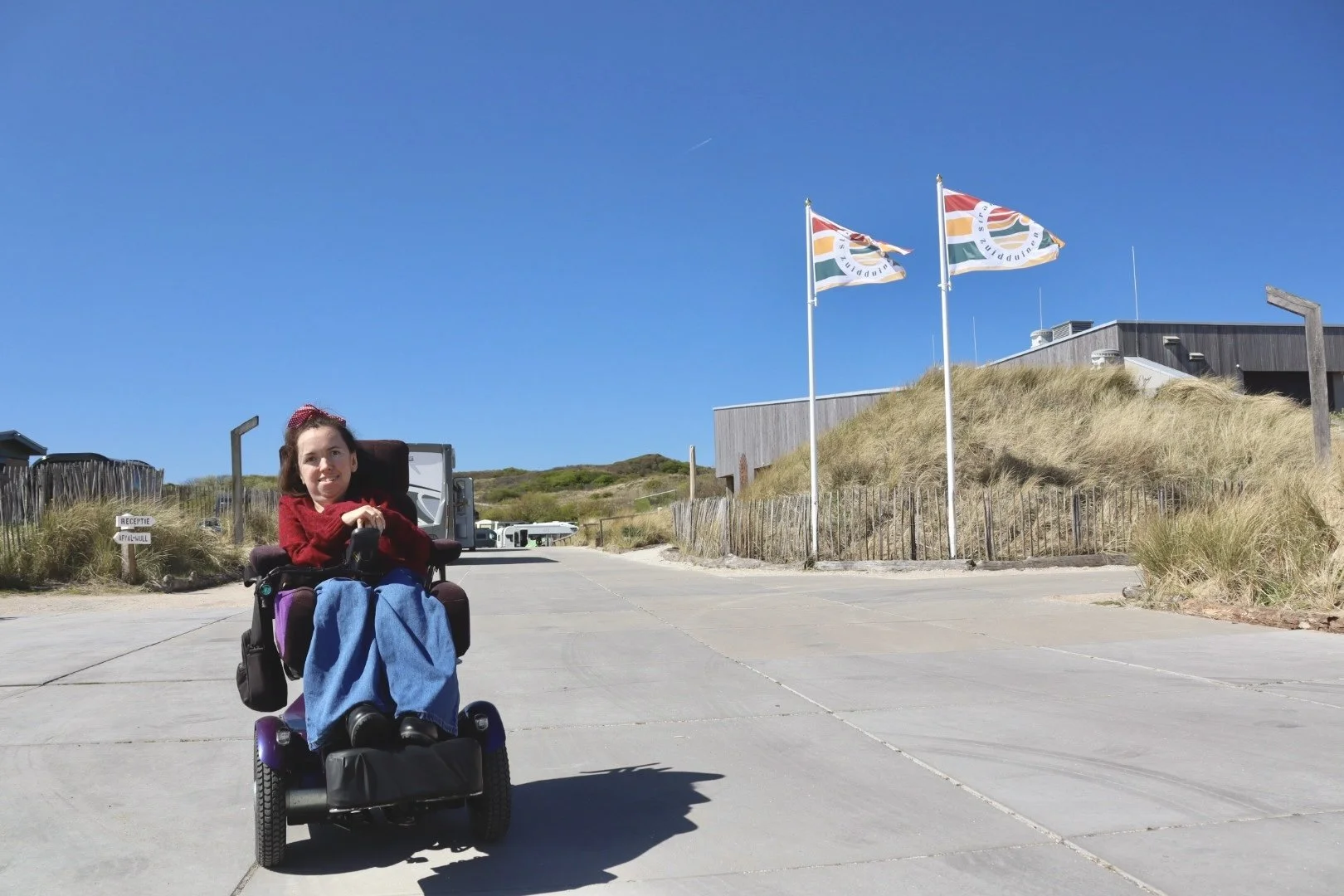  Karla in her Balder powerchair at the Strandcamping Zuiduinnen campsite in the Netherlands  