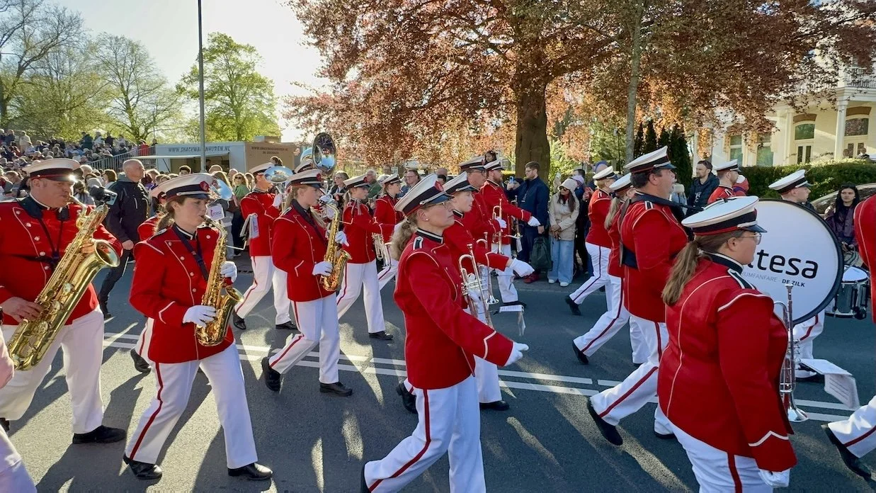  The marching band at the Bloemencorso Bollenstreek flower parade, passing through Hillegom in the Netherlands  