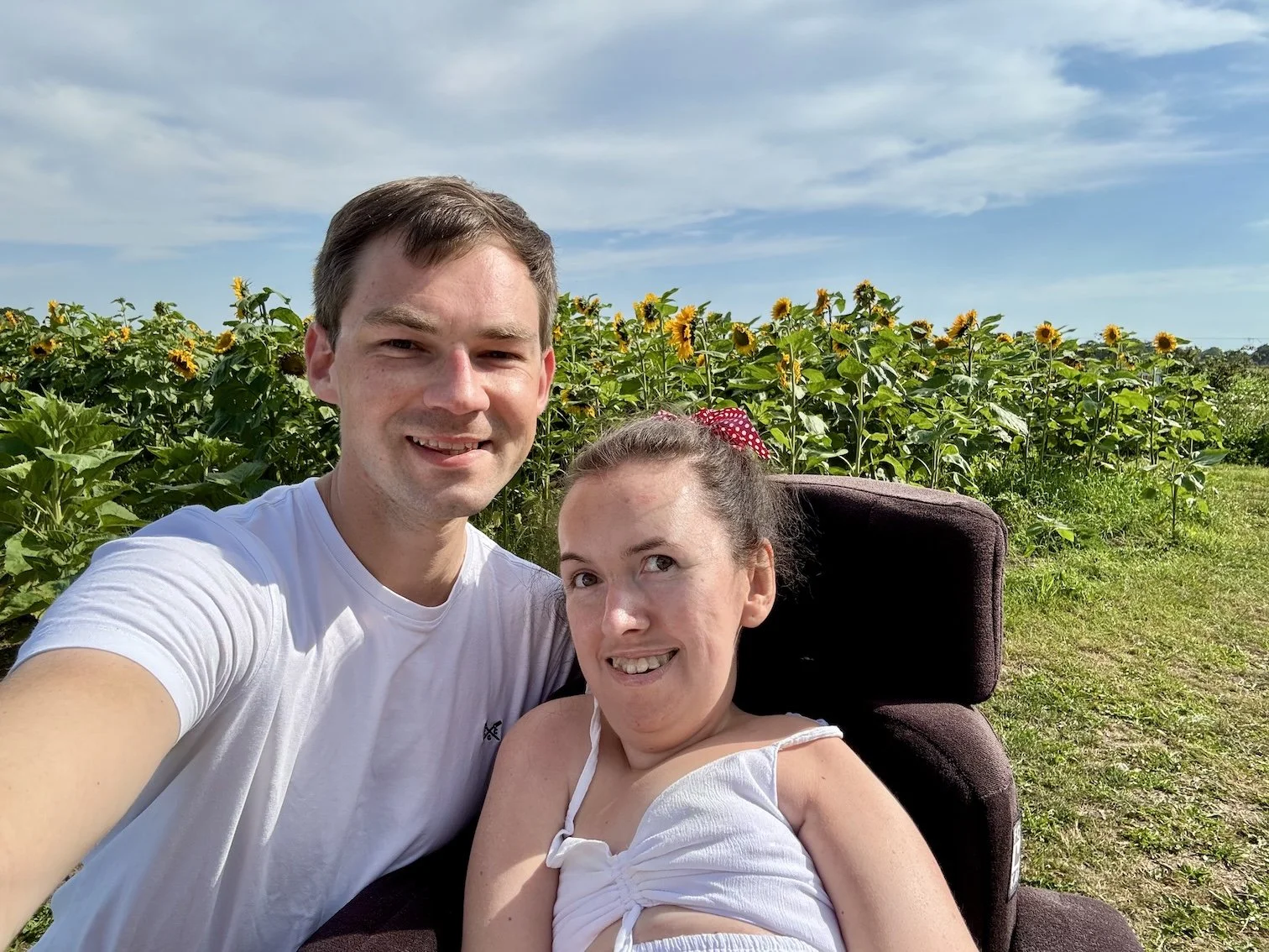  Stephen and Karla by the sunflowers at Dan Tanners Sopley Farm in the New Forest 
