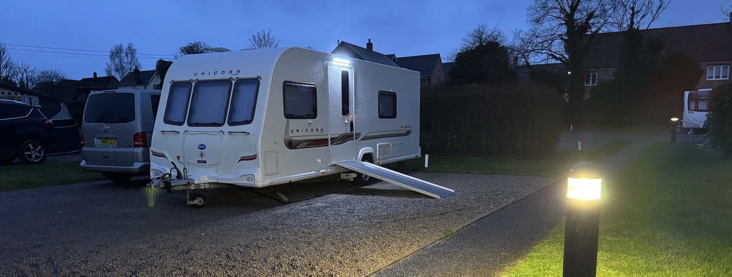A wheelchair accessible caravan with a ramp, on a pitch at Ashridge Farm Caravan and Motorhome Club Site