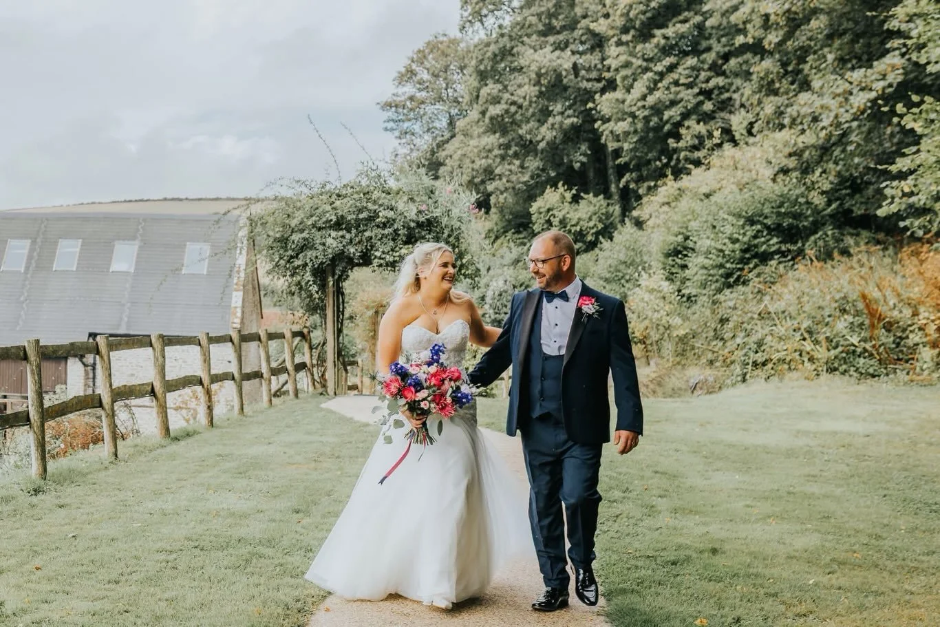 One year on from M &amp; J&rsquo;s beautiful wedding day 💕💙

Their florals were filled with vivid pinks and natural blues, arranged in a relaxed, rustic style to complement the gorgeous countryside setting at Gorwell Farm. 🌿✨

Such a beautiful day