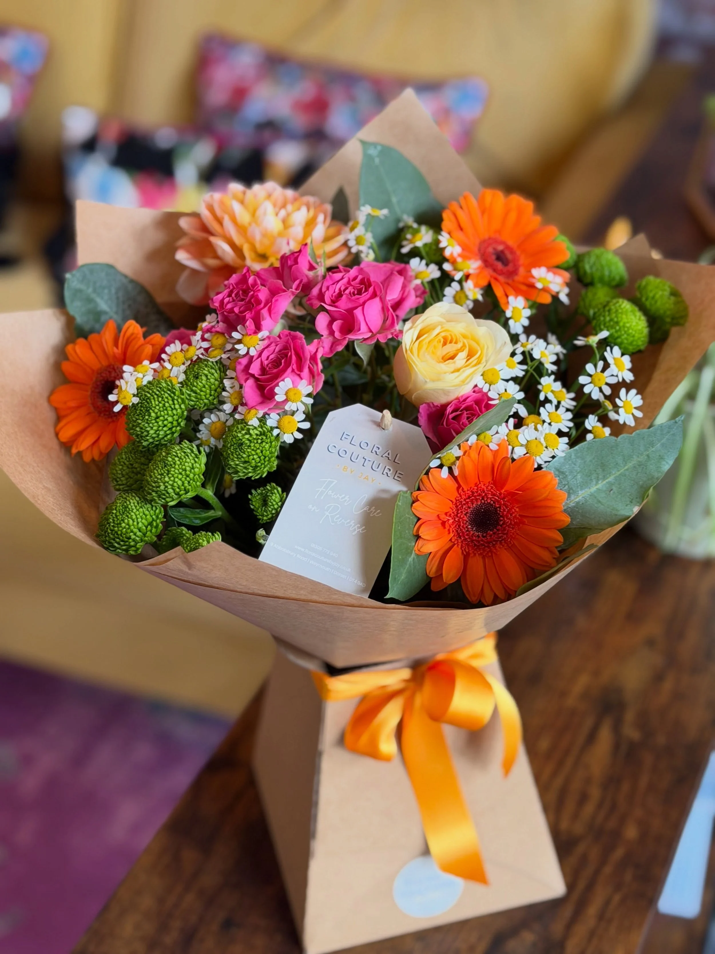 🌸 Petite, but packed with personality. 🌸

Meet one of our Petite Bouquets at Floral Couture by Jay 💐

A gorgeous burst of hot pink, vibrant orange, soft yellow and fresh green, finished with delicate daisies and wrapped in our signature style. Pro