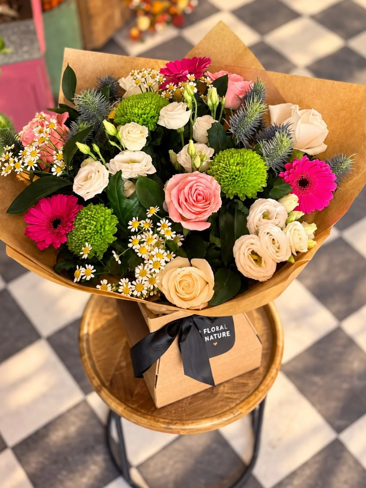 🌸 A little bit of happiness, wrapped in flowers 🌸

Soft blush roses, vibrant pink gerberas, fresh green blooms and delicate pops of daisy-like flowers come together in this gorgeous hand-tied bouquet. 💕🌿

Beautifully wrapped and finished with our