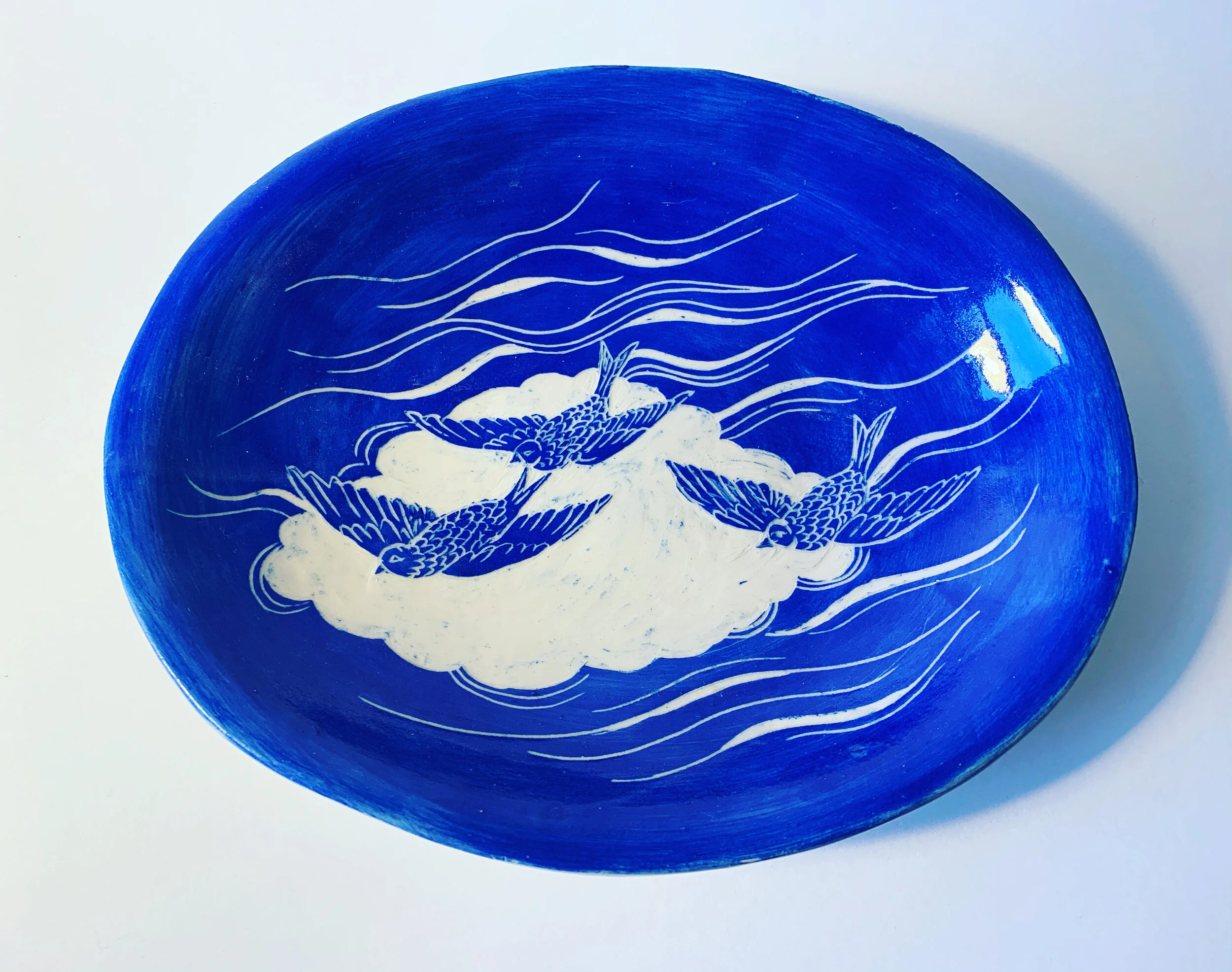 Swallows. Sgrafitto. Stoneware. Glaze.