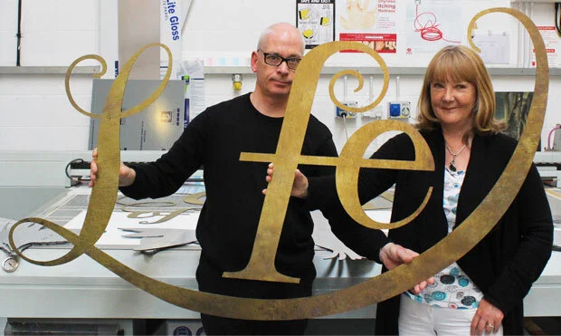 Cutout-Lettering-in-Aged-Brass