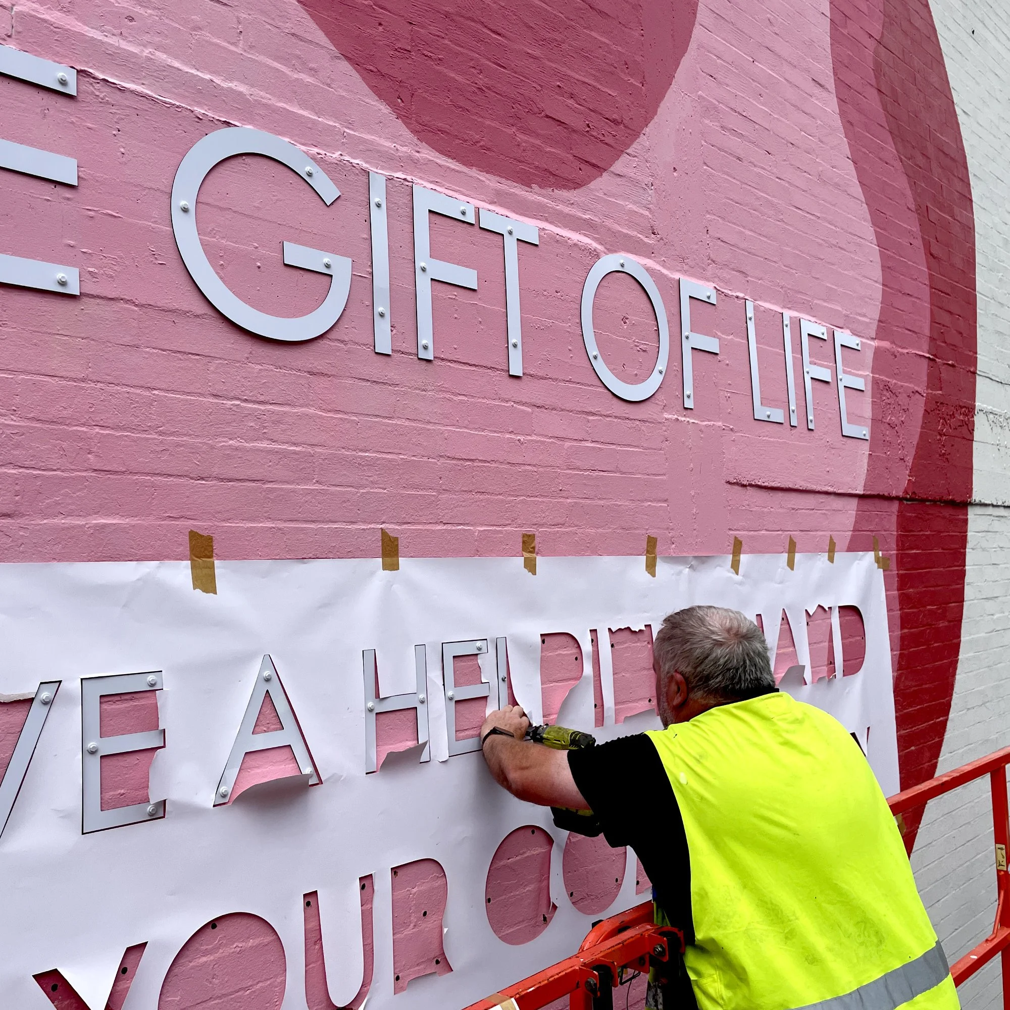 John Simpson Installing Panels.jpg