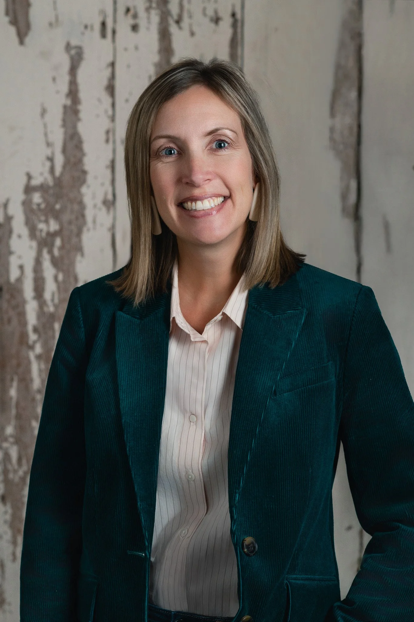 Kim Keane organizational consultant green blazer