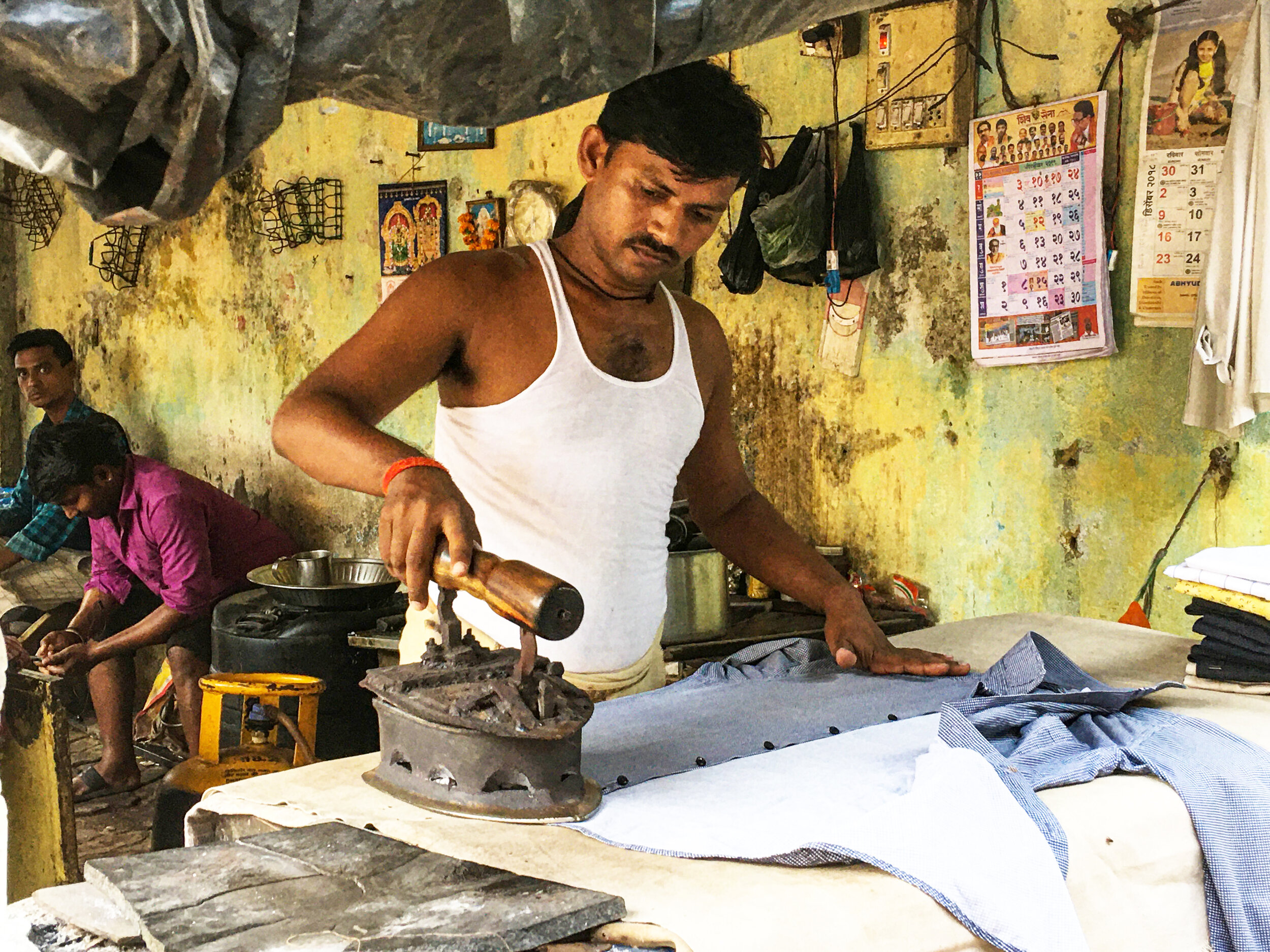 Man Ironing Shirts.jpg