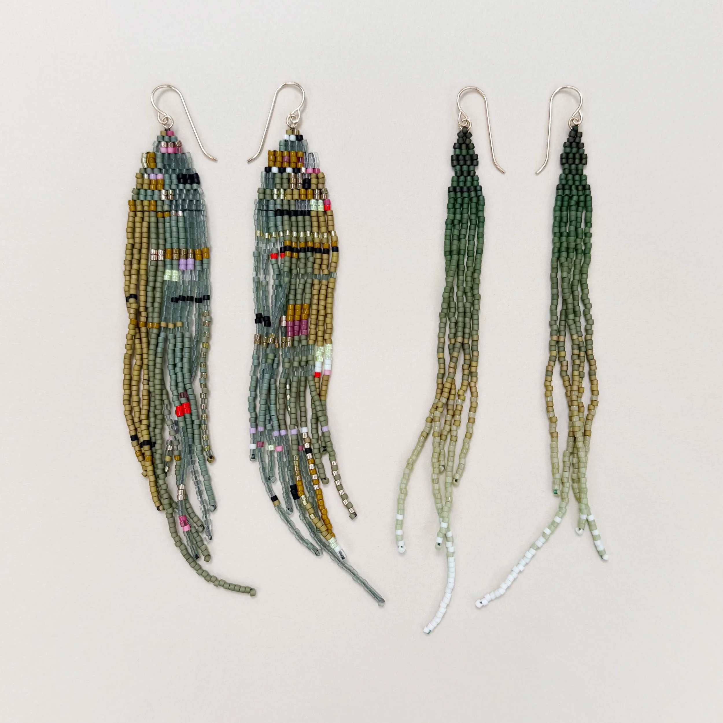 2+pairs+of+Jungle+Green+beaded+earrings.png