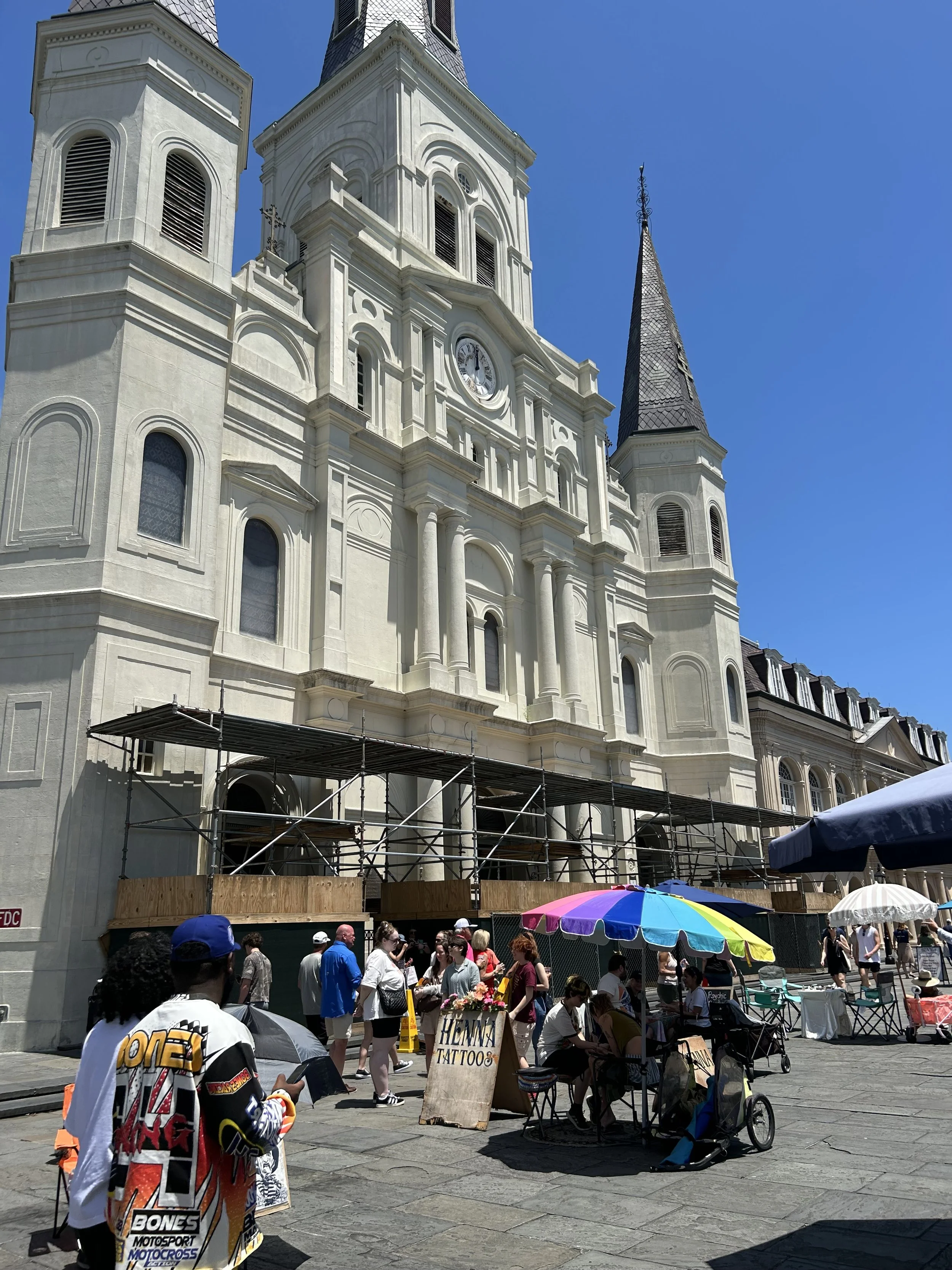 Historic church with vibrant street life