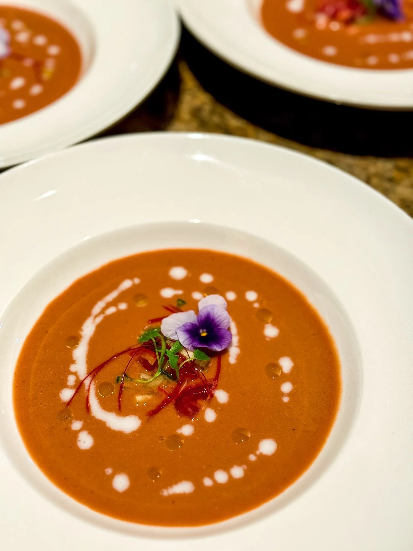 Sipping on the last tastes of summer 🍅🍉✨ 

Tomato + Watermelon Gazpacho 
Sweet watermelon meets sun-ripe tomatoes, with cool cucumber, creamy coconut milk, and a zing of ginger balsamic. Pops of finger lime, Korean chili threads, and fresh cilantro