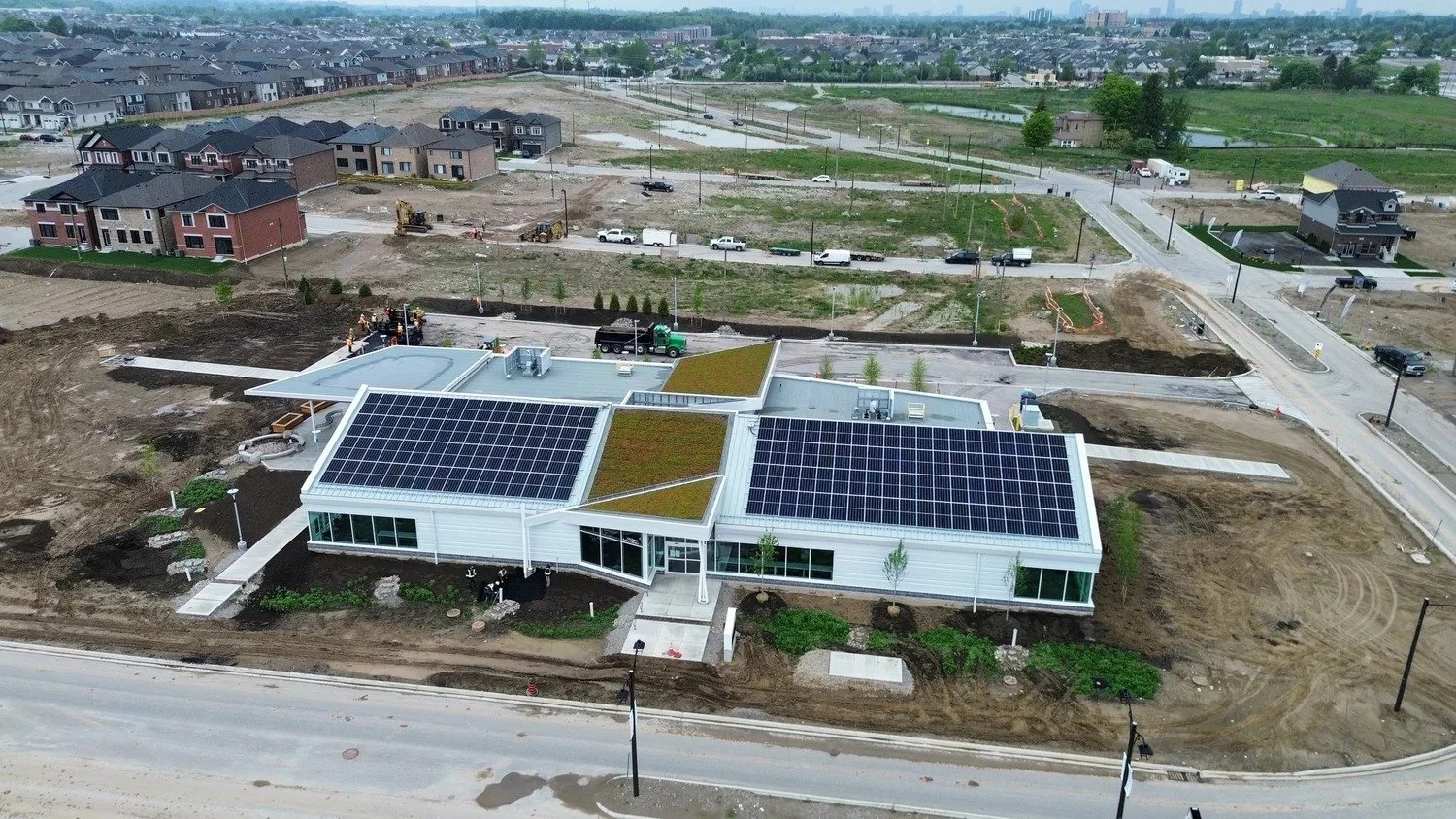 Beautiful and hard-working, green roofs support vegetation on top of buildings through multi-layered, engineered systems. Their benefits go far beyond aesthetics. Green roofs help slow stormwater runoff through natural retention, and help in reducing