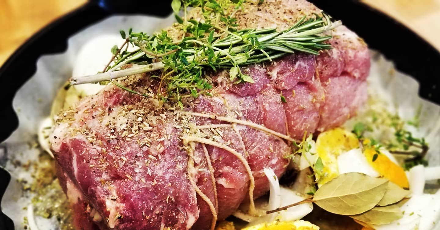 I butterflied and tied up a stuffed pork roast porchetta style with fennel, oranges, onions, garlic, fresh garden thyme and rosemary. I stuffed in a few porcini mushrooms for that italian umami and splashed and rubbed the inside and out with spiced r
