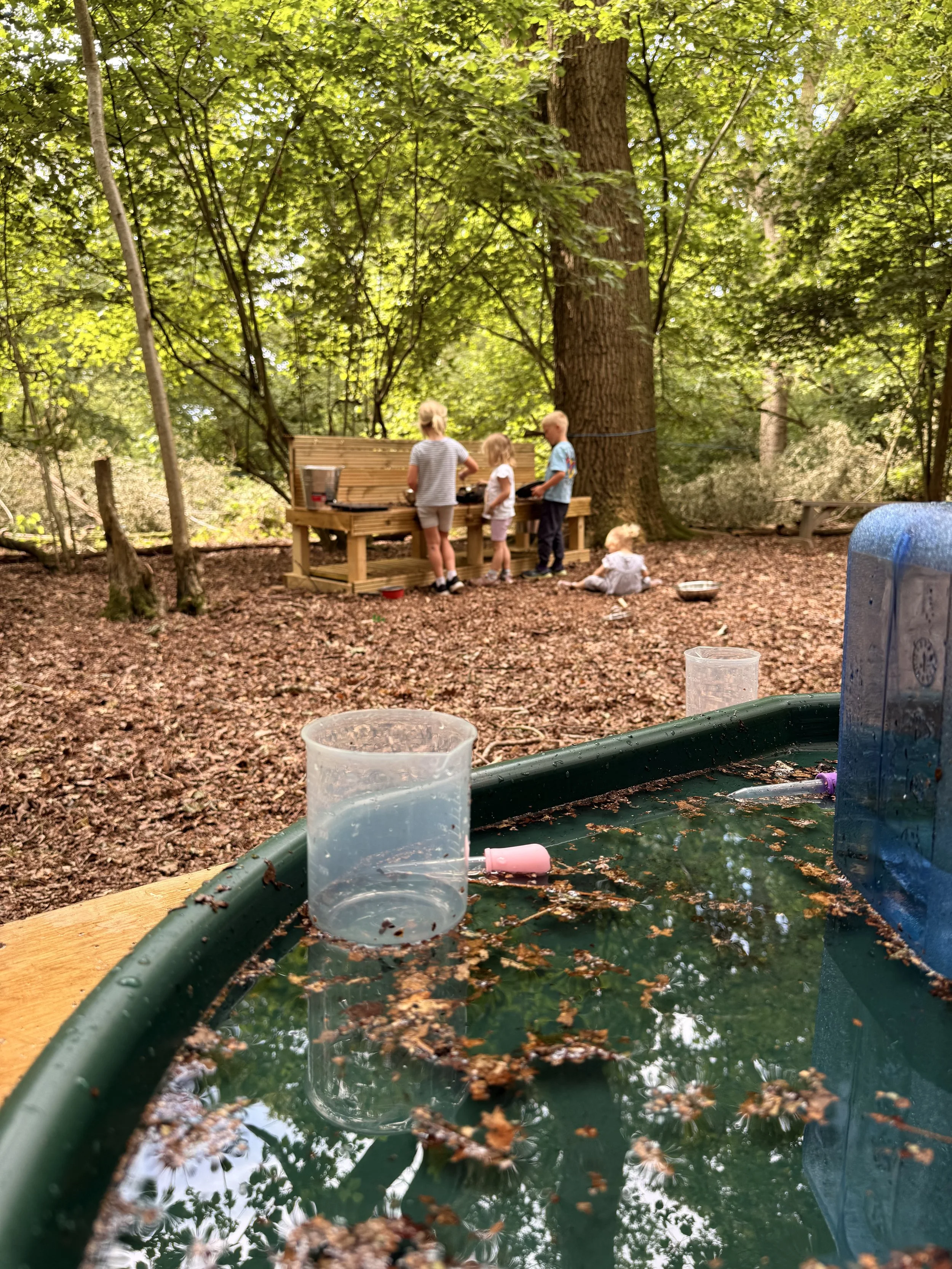 Cooking up a storm in the mud kitchen