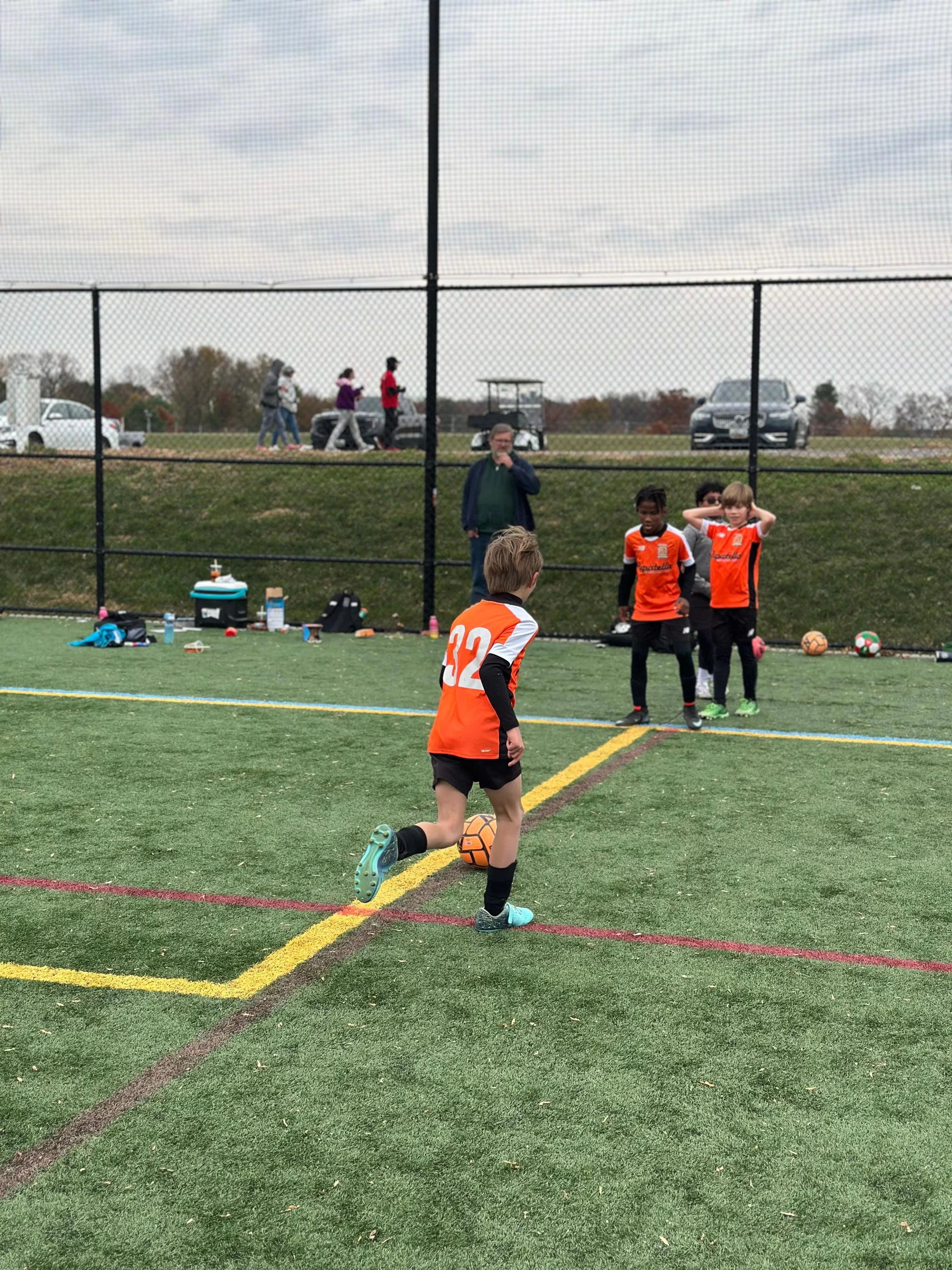 U10 Boys Black_U11 Boys Orange.jpeg