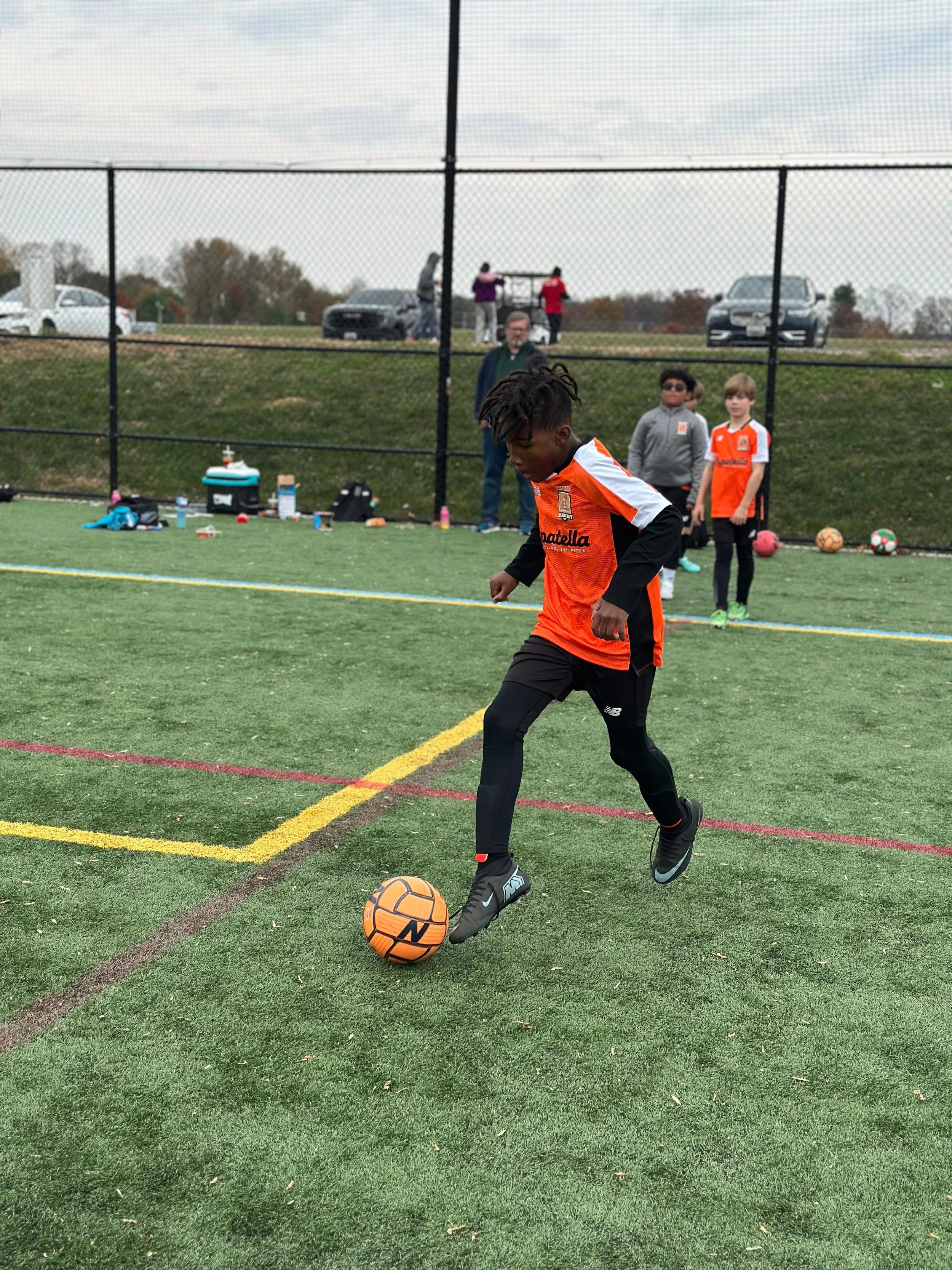 U10 Boys Black_U11 Boys Orange4.jpeg