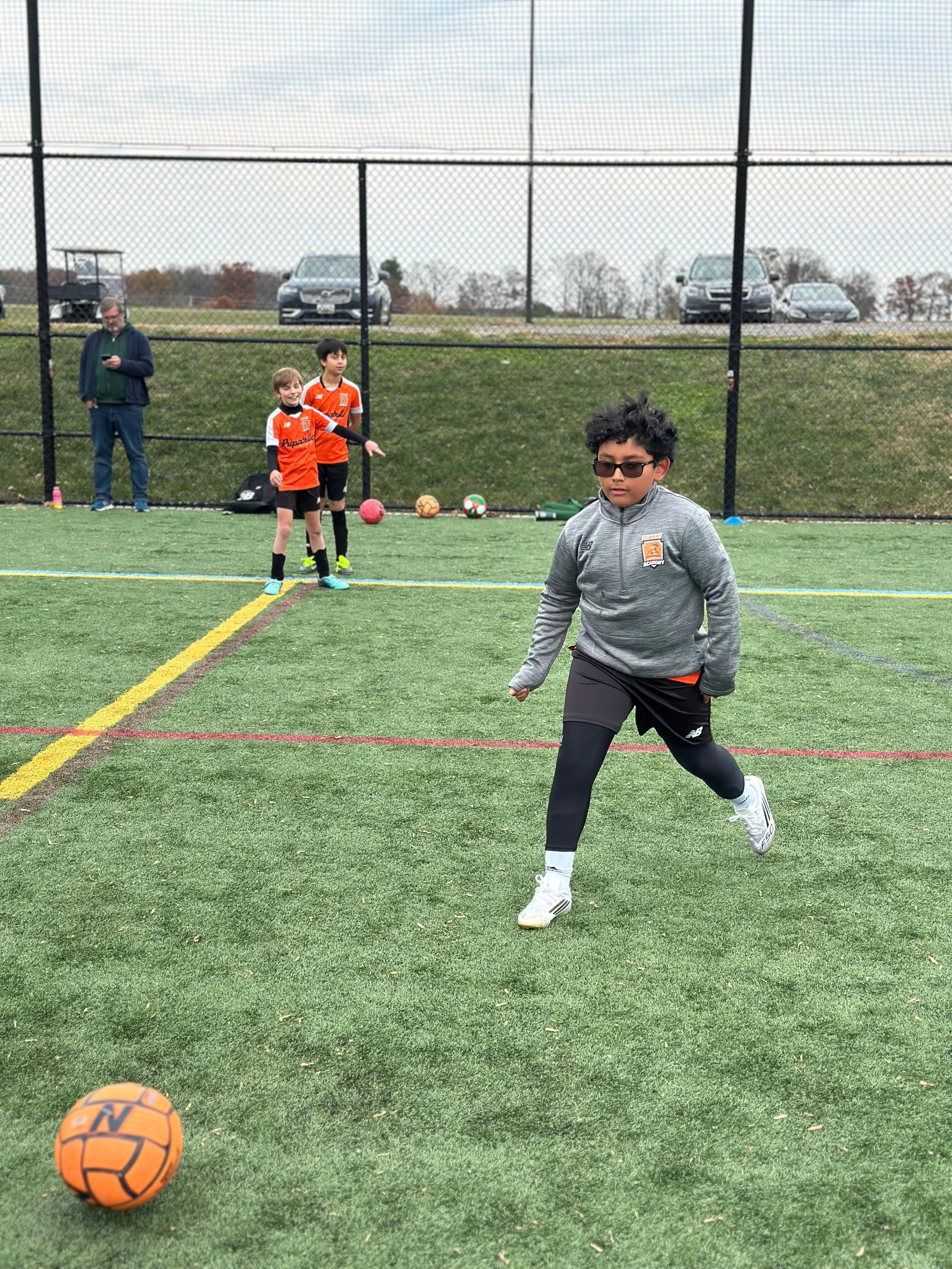 U10 Boys Black_U11 Boys Orange2.jpeg