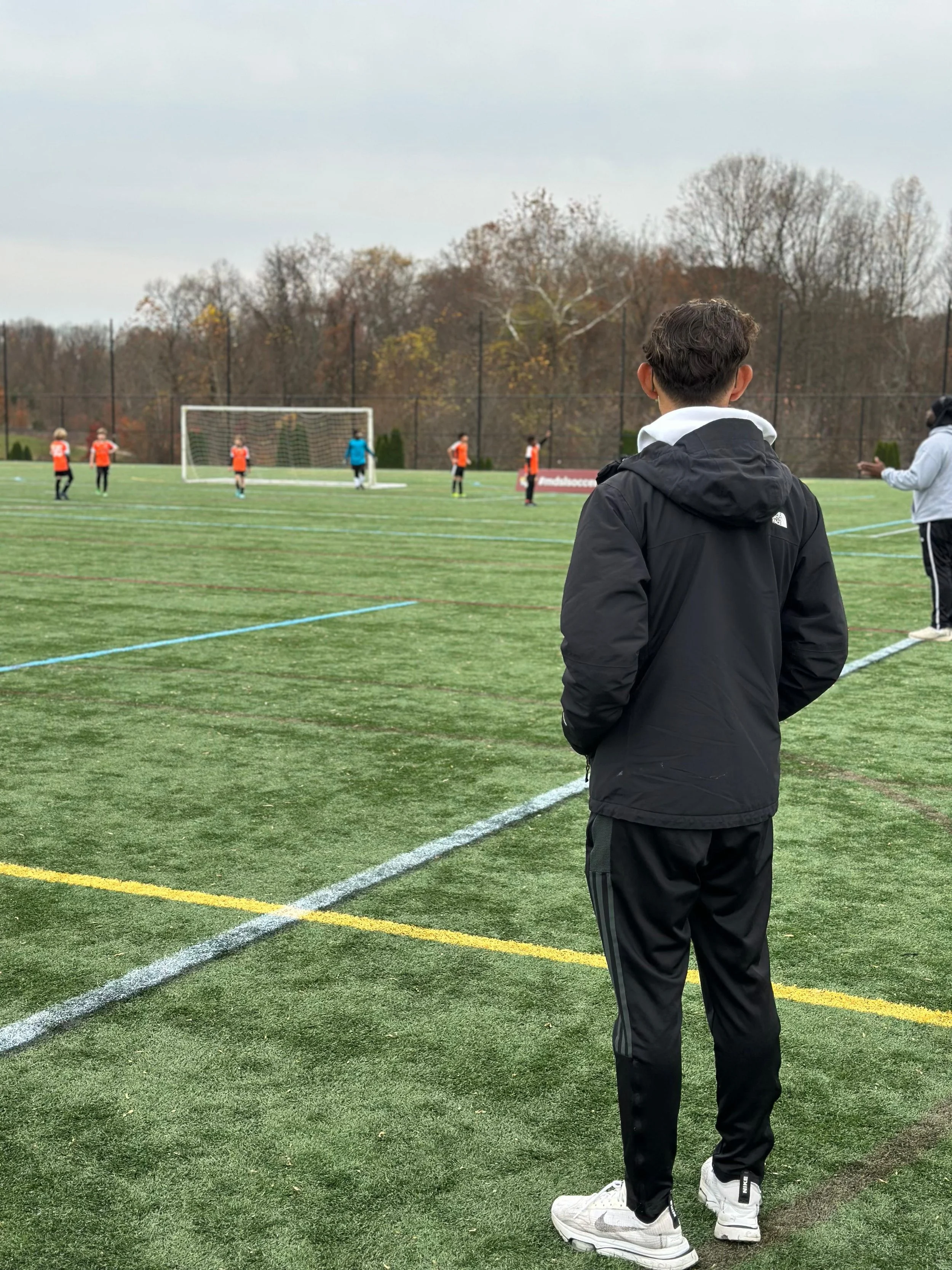 U10 Boys Black_U11 Boys Orange_Coach Nelson1.jpeg