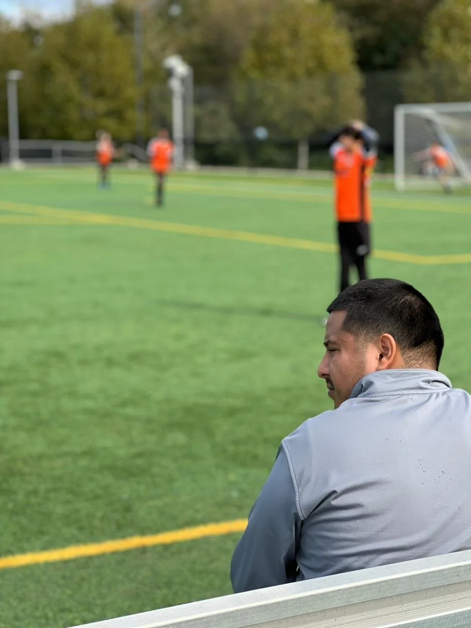 2014 Boys Orange_Coach Leo1.jpeg