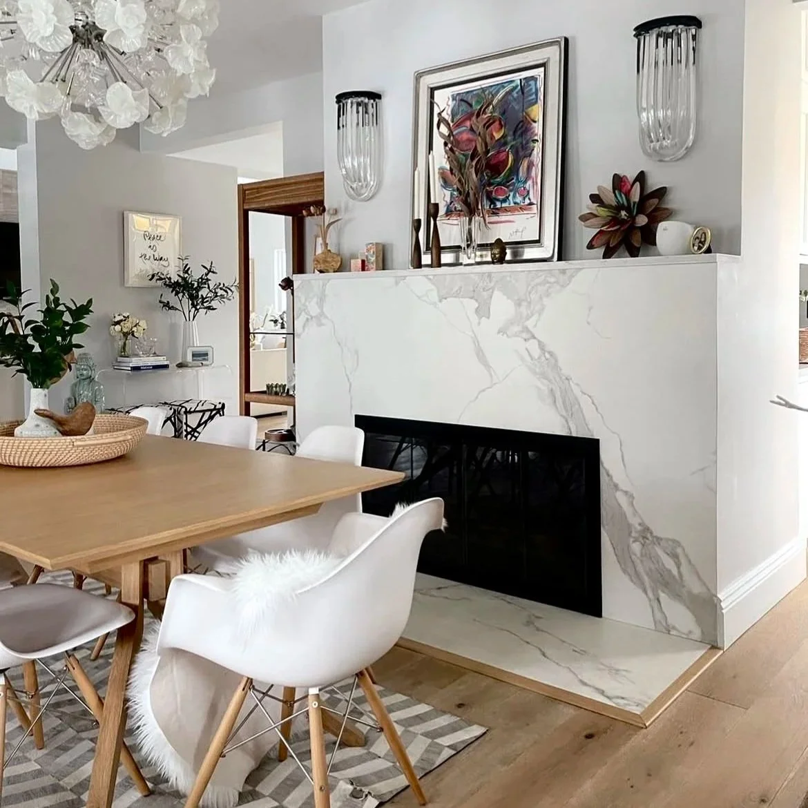 Minimalist stone fireplace surround and hearth by Intermarble in Port Washington, New York