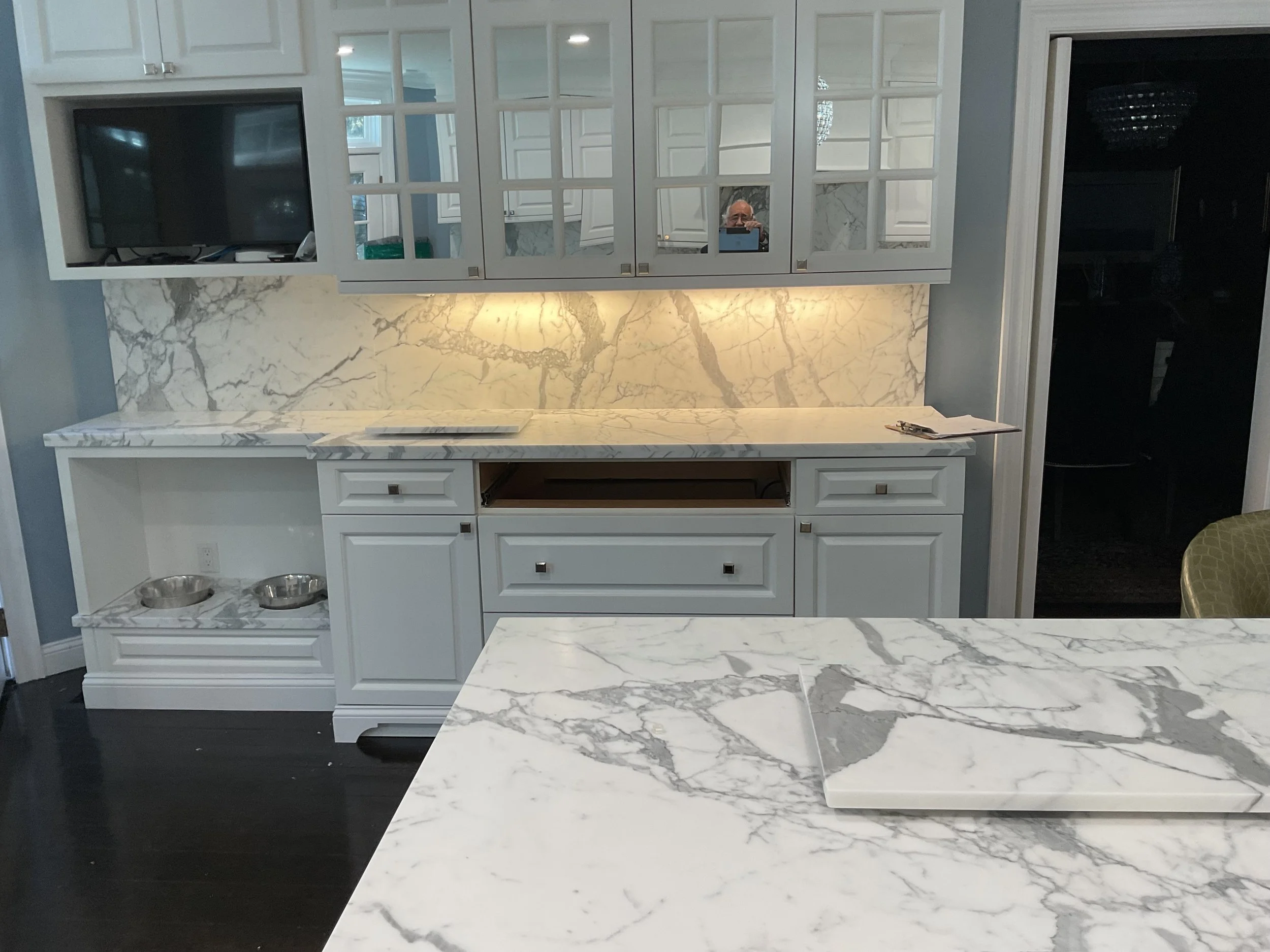 Statuario marble kitchen installation by Intermarble for a residential project in Locust Valley, New York