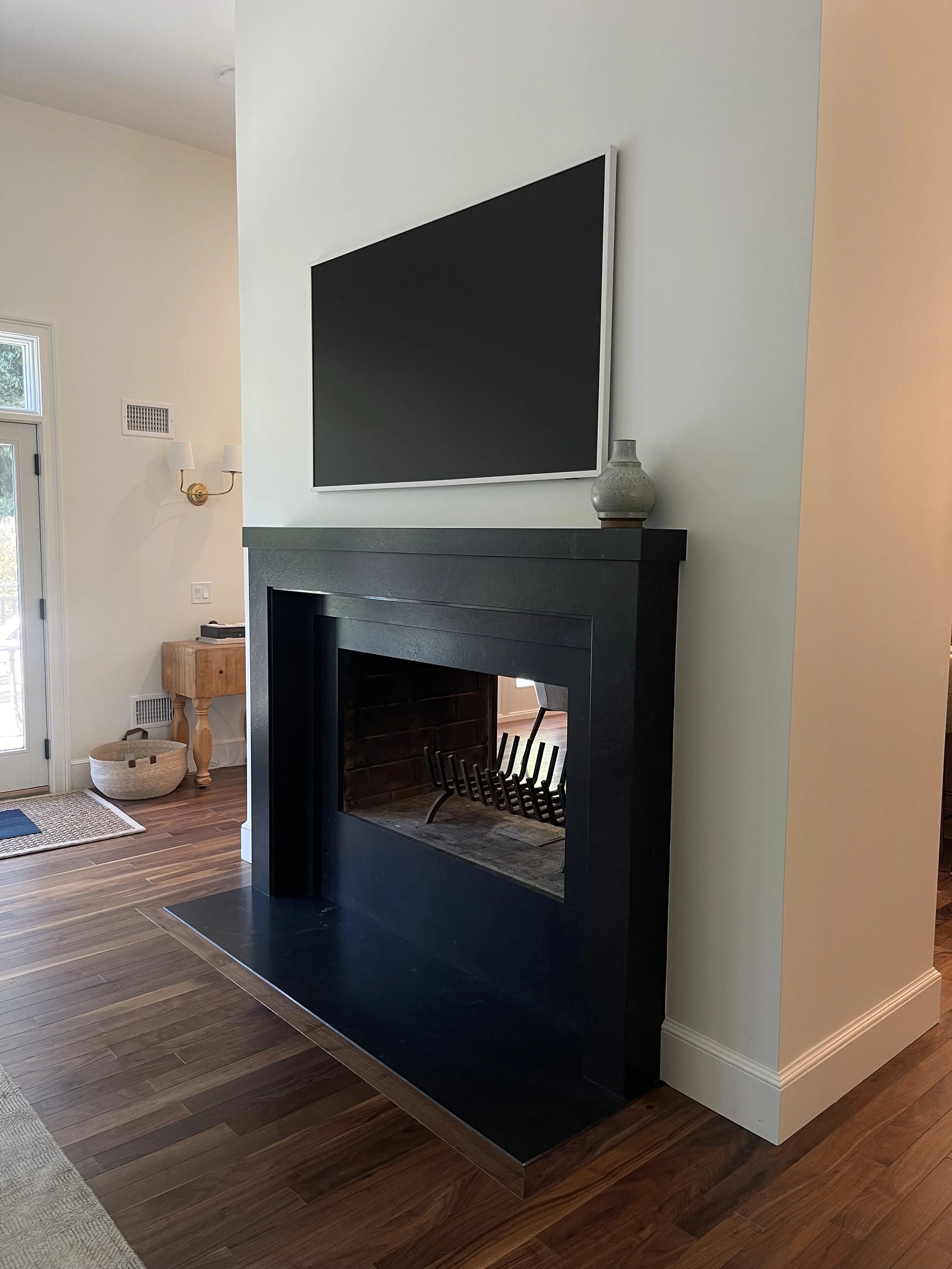 Mitered granite fireplace surround, mantle, and hearth installation by Intermarble in Nassau County, NY