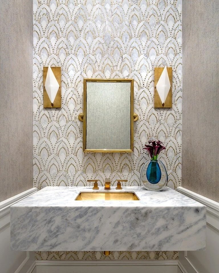 Cielo marble floating vanity by Intermarble for a powder room in Long Island, New York