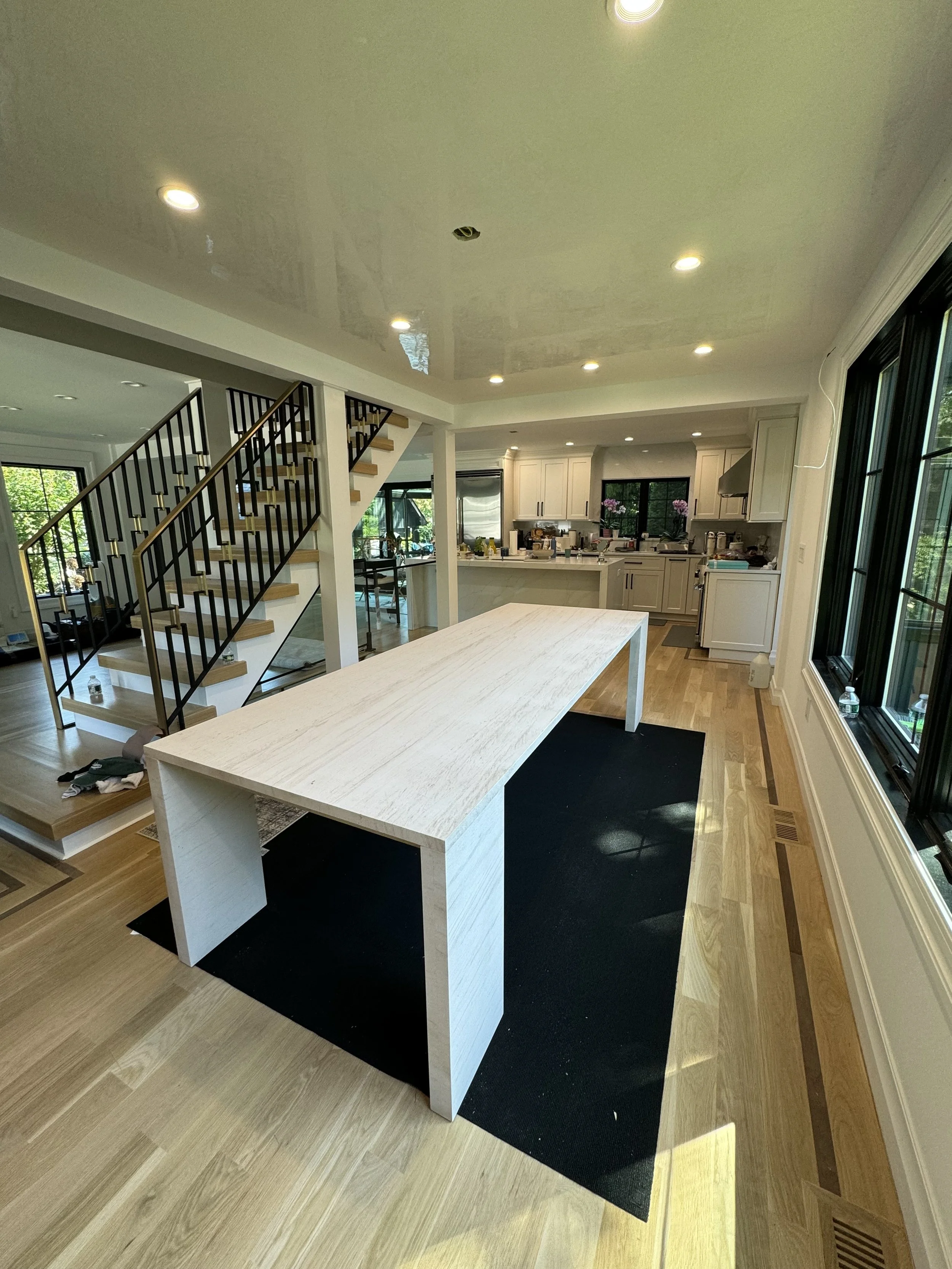 Travertine dining room table. Made by Intermarble for a residential project in Valley Stream, New York. 