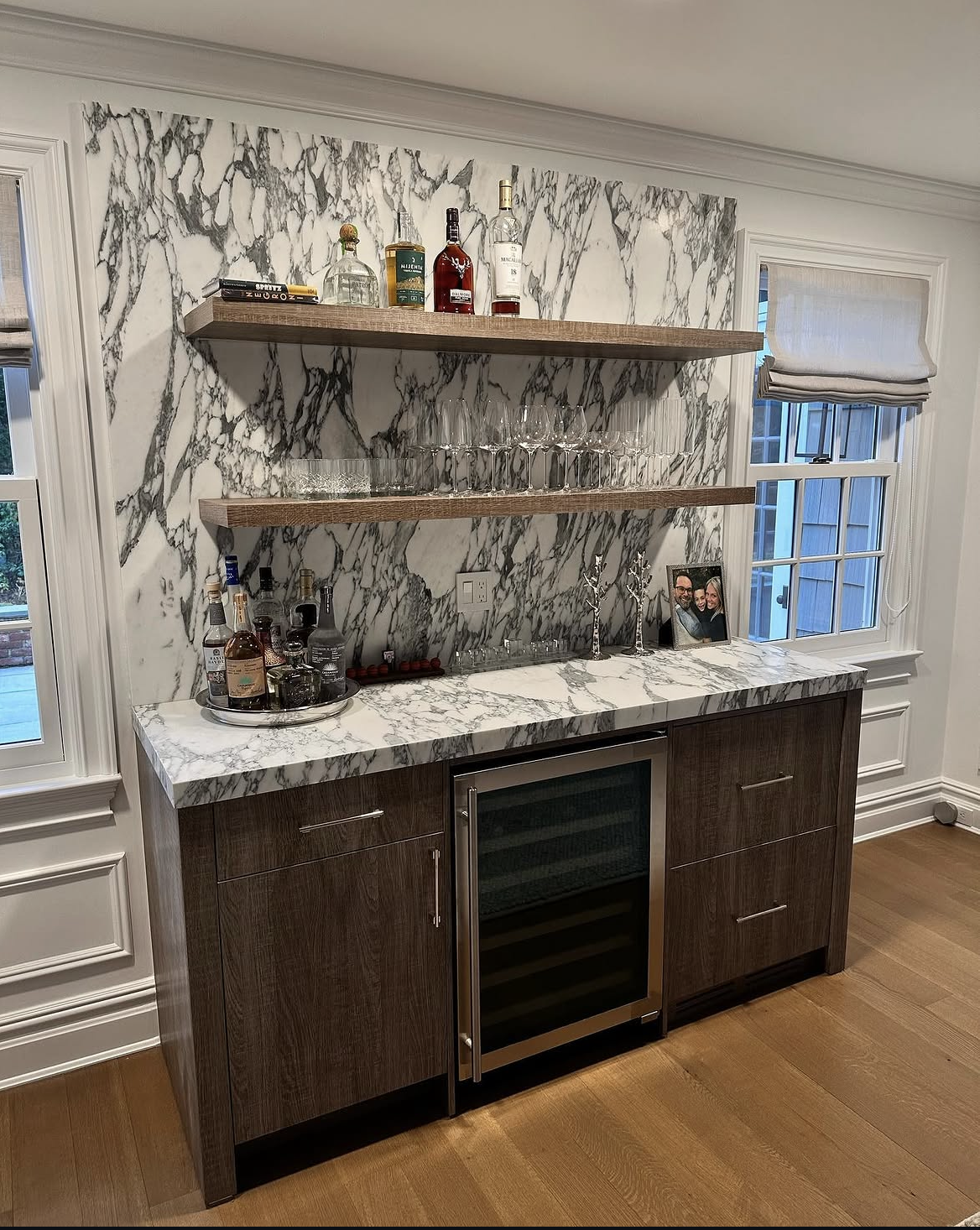 Arabescato accent bar wall and countertop installation by Intermarble. Sands Point, New York