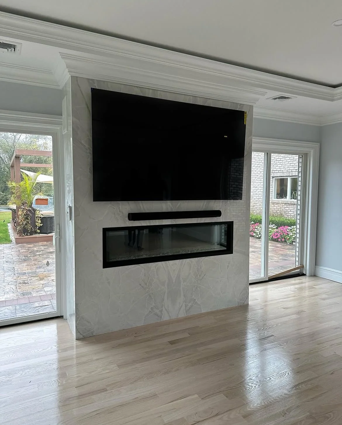 Bookmatched marble fireplace surround by Intermarble for Sands Point, NY residence