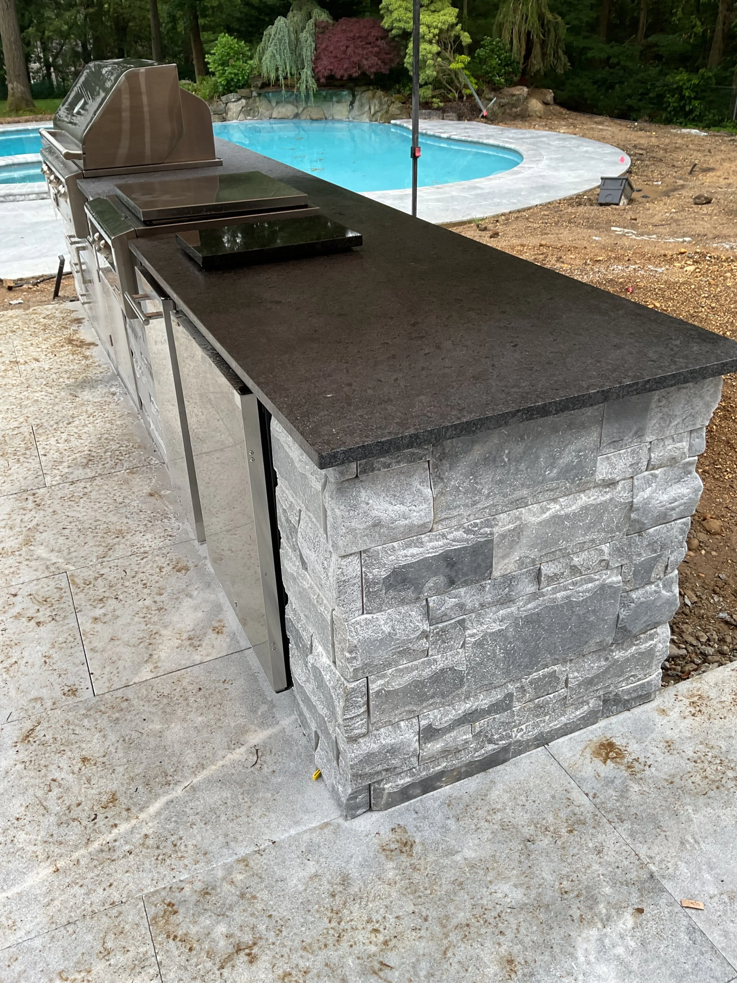Leathered black absolute granite outdoor kitchen bbq top in Sands Point, NY, by Intermarble