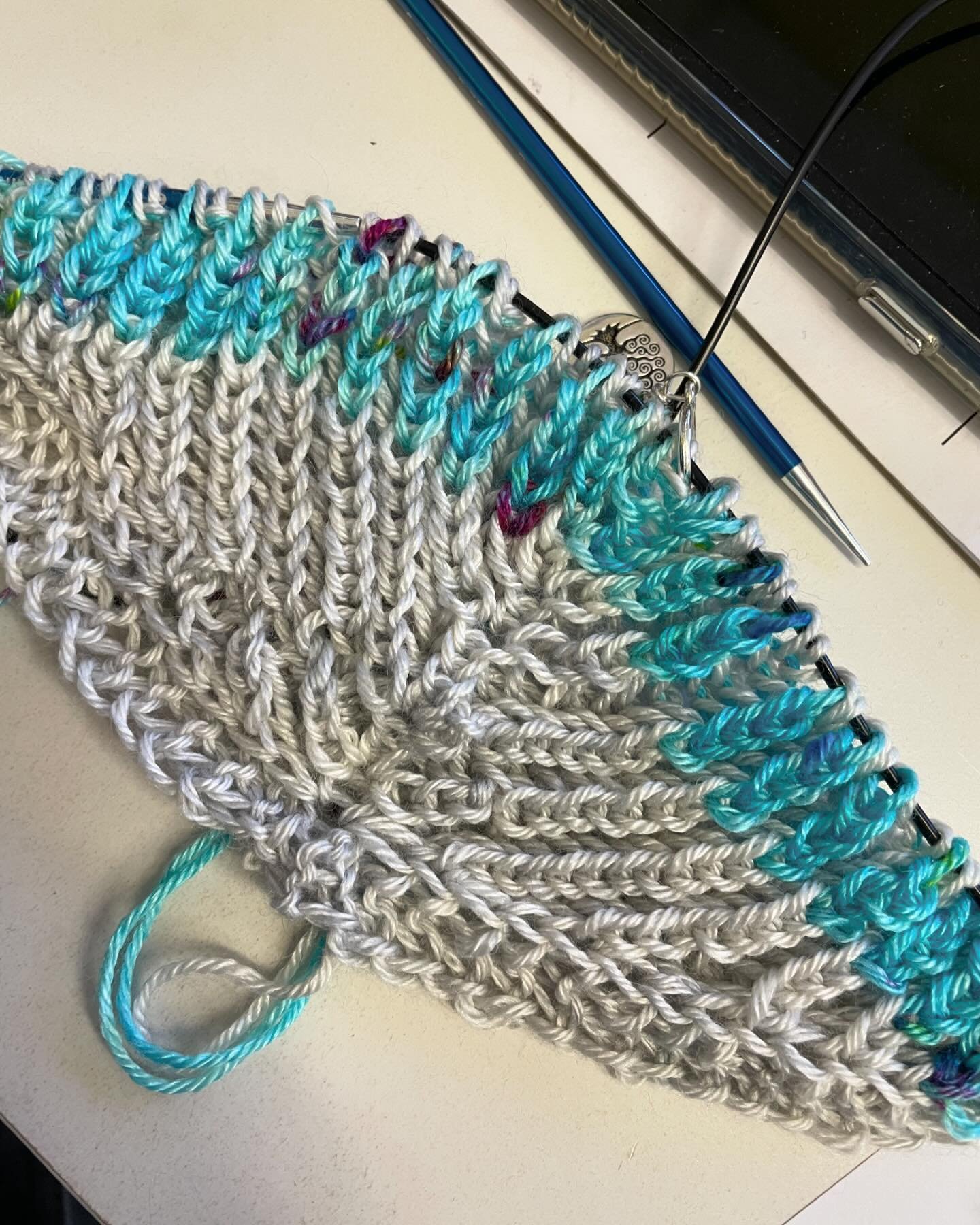 Progress on my #carillonshawl as I didn&rsquo;t cast on (last week 🥴) when I wanted to but today. I&rsquo;m using Aurora and Monteleone White on Luxe, which is admittedly a lighter weight than the pattern calls for (this is fingering and the pattern