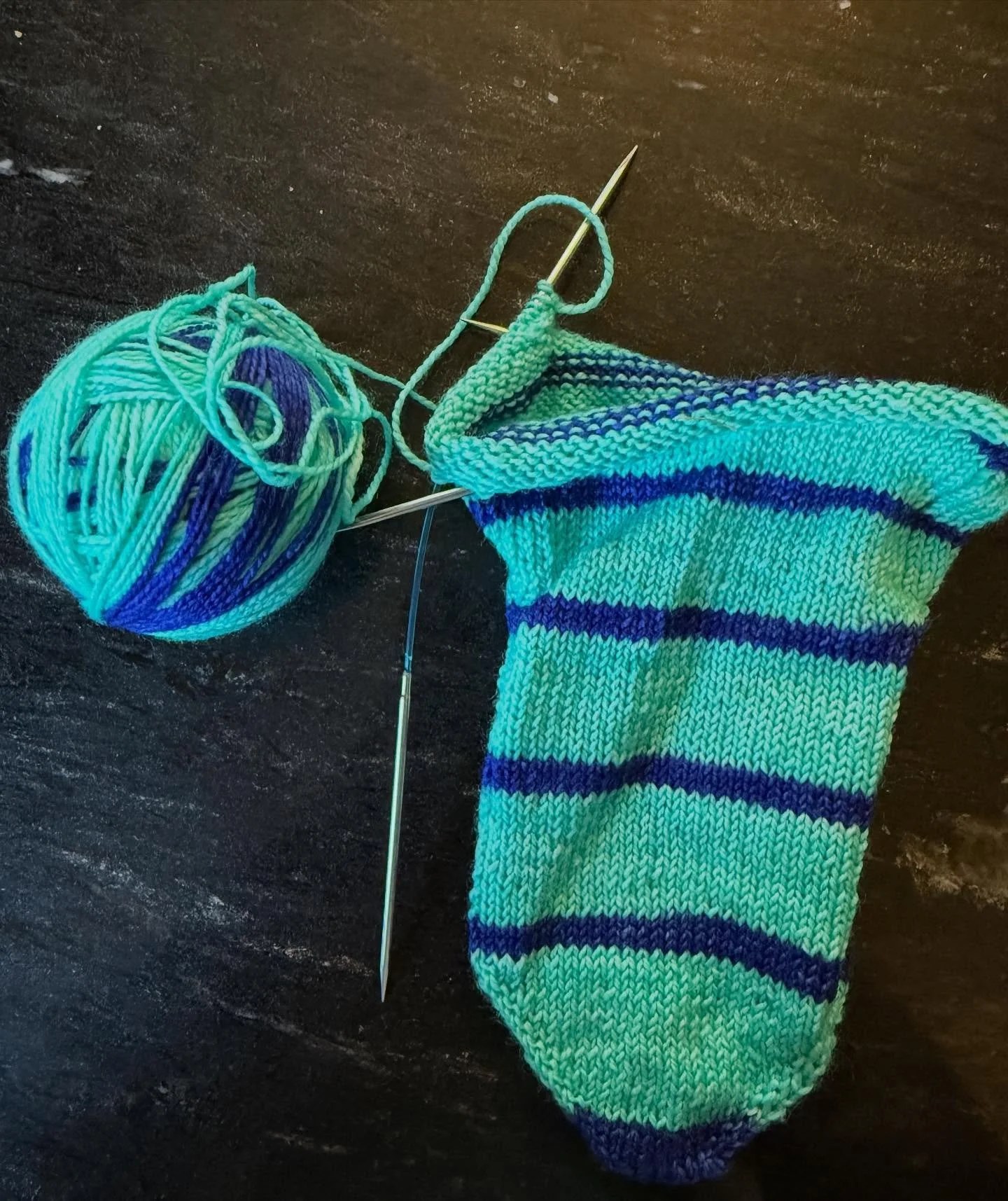 Anyone else doing #socktober?  I&rsquo;m starting with the Toe Up Larch Peds by @lauranelkin using self striping yarn by @whitebirchfiberarts (I&rsquo;ll find the ball band for the colorway). Loving it so far!! #socks #handknitsocks #selfstripingyarn