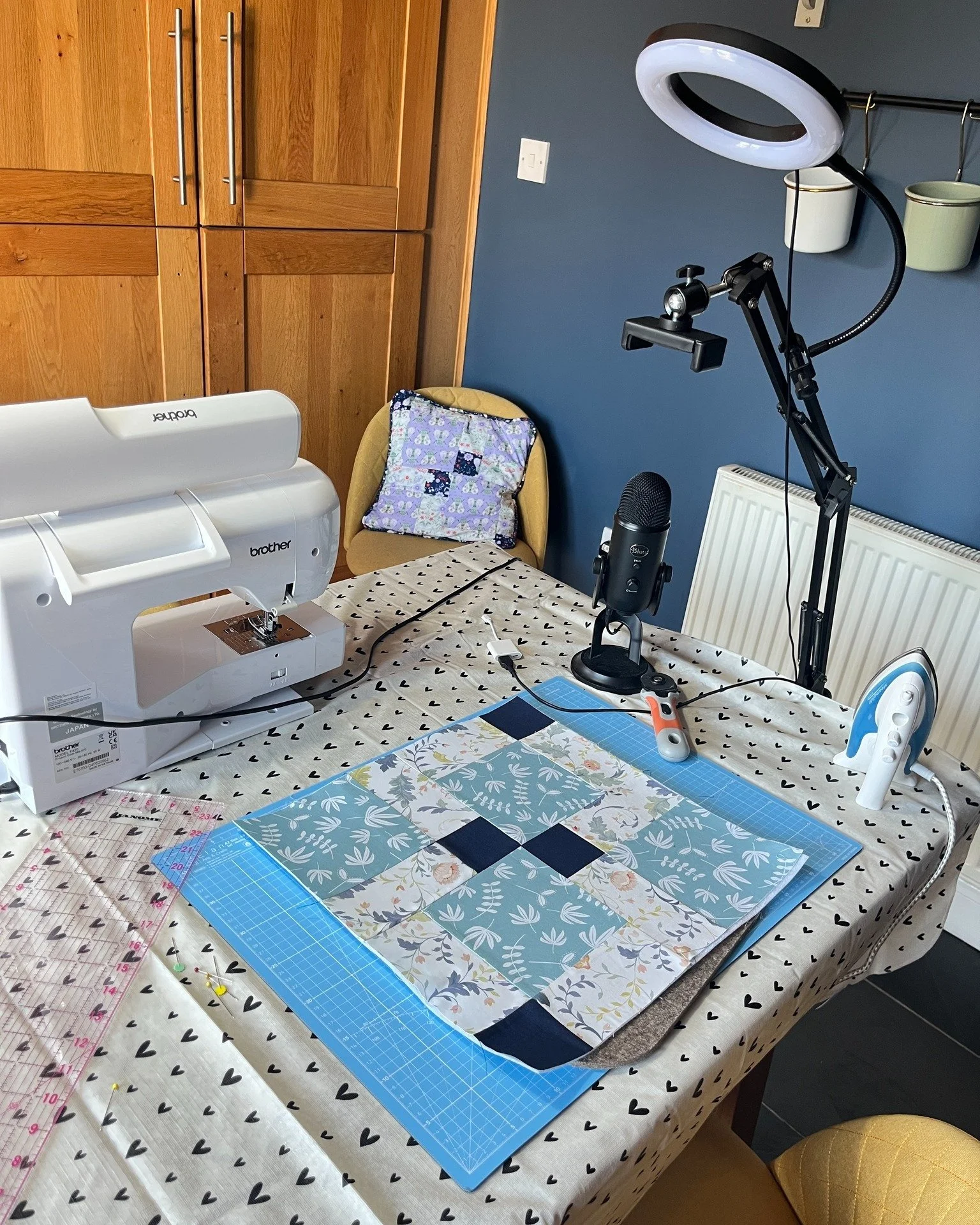 Behind the scenes today 🎥🧵

Full filming mode. Equipment everywhere. Tea going cold.

I'm filming piecing a cushion cover for this month's sew-a-long project: A cushion cover with a zip and piping, and yes, we will be making our own piping, cause w