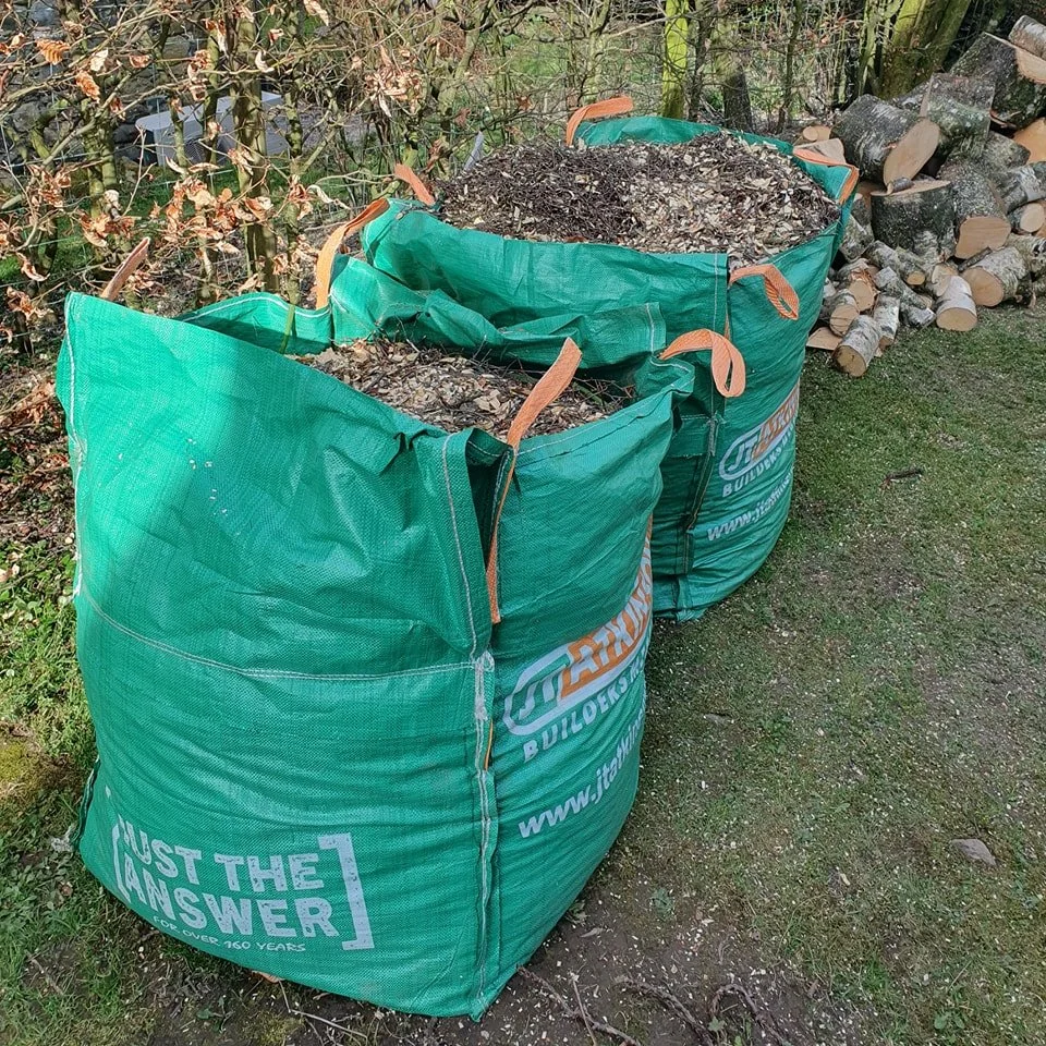Branches chipped directly into bags for a tidy storage solution and giving the customer a useful byproduct from the tree.