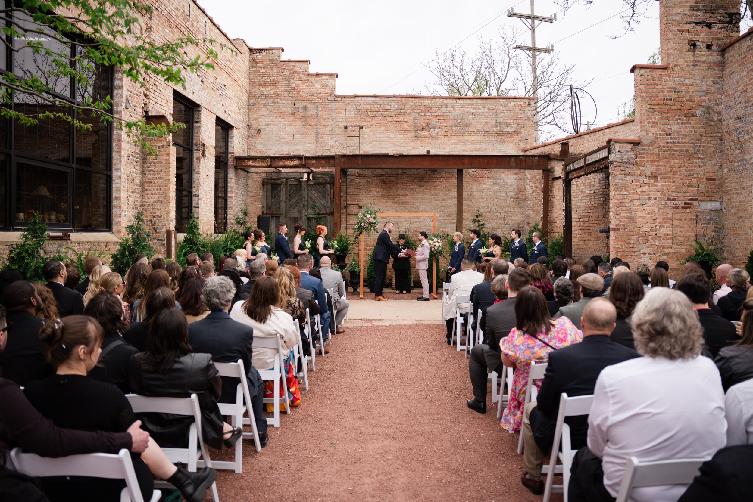 A wedding reception with lots of guests